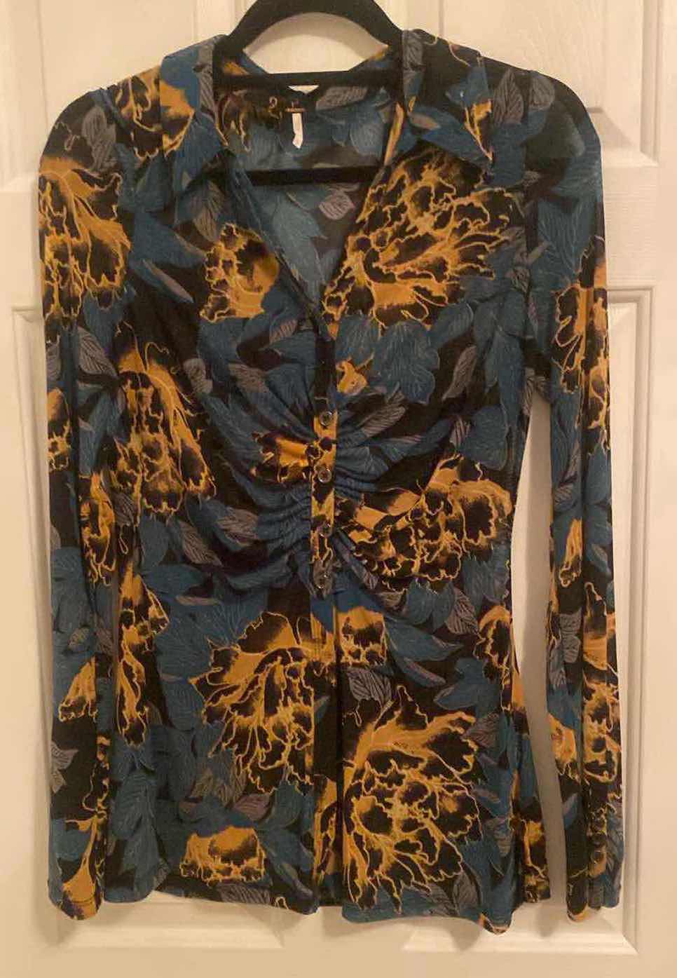 Photo 1 of LADIES SIZE LARGE FREE PEOPLE SHIRT