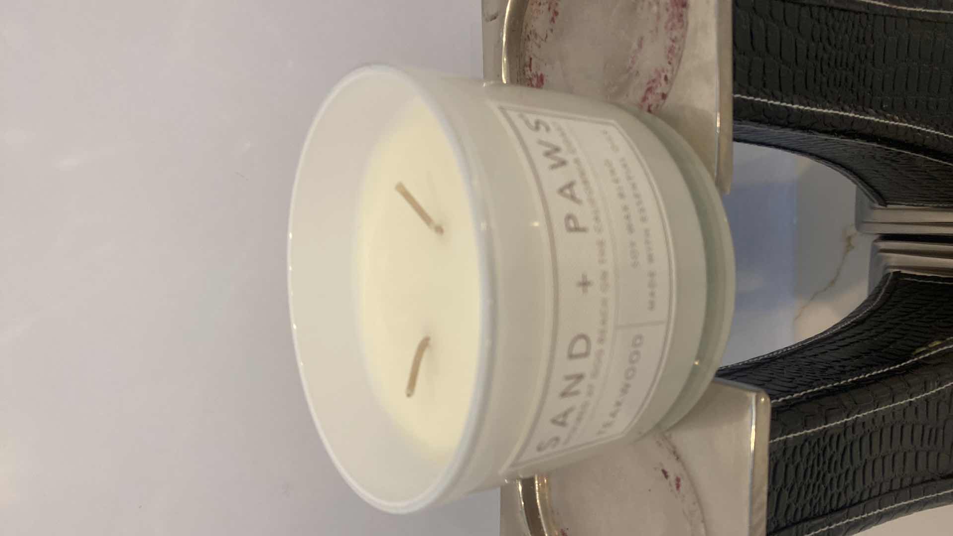 Photo 1 of PAIR OF BLACK FAUX ALLIGATOR AND CHROME CANDLE HOLDERS H 13” AND SAND & PAWS SOY CANDLE