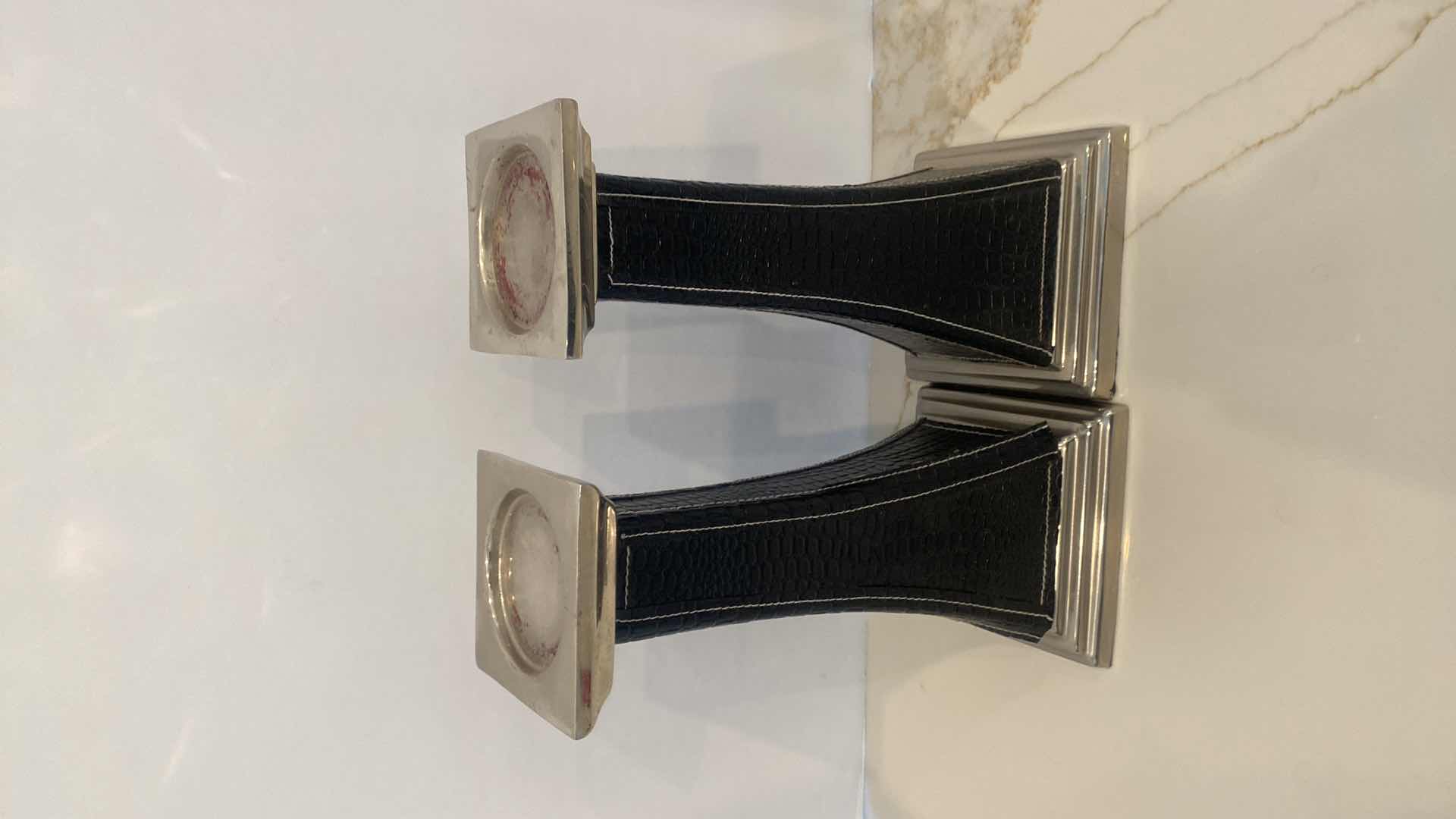 Photo 1 of PAIR OF BLACK FAUX ALLIGATOR AND CHROME CANDLE HOLDERS H 13” AND SAND & PAWS SOY CANDLE