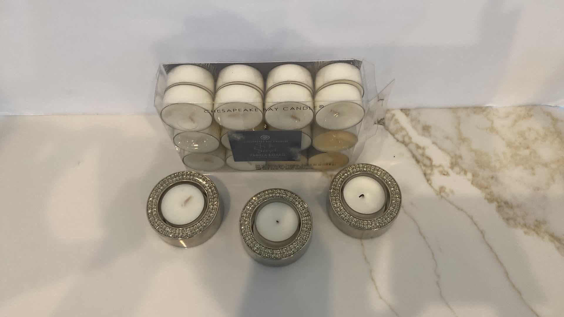 Photo 1 of VOTIVE CANDLES AND BLING VOTIVE HOLDERS FRIM Z GALLERIE