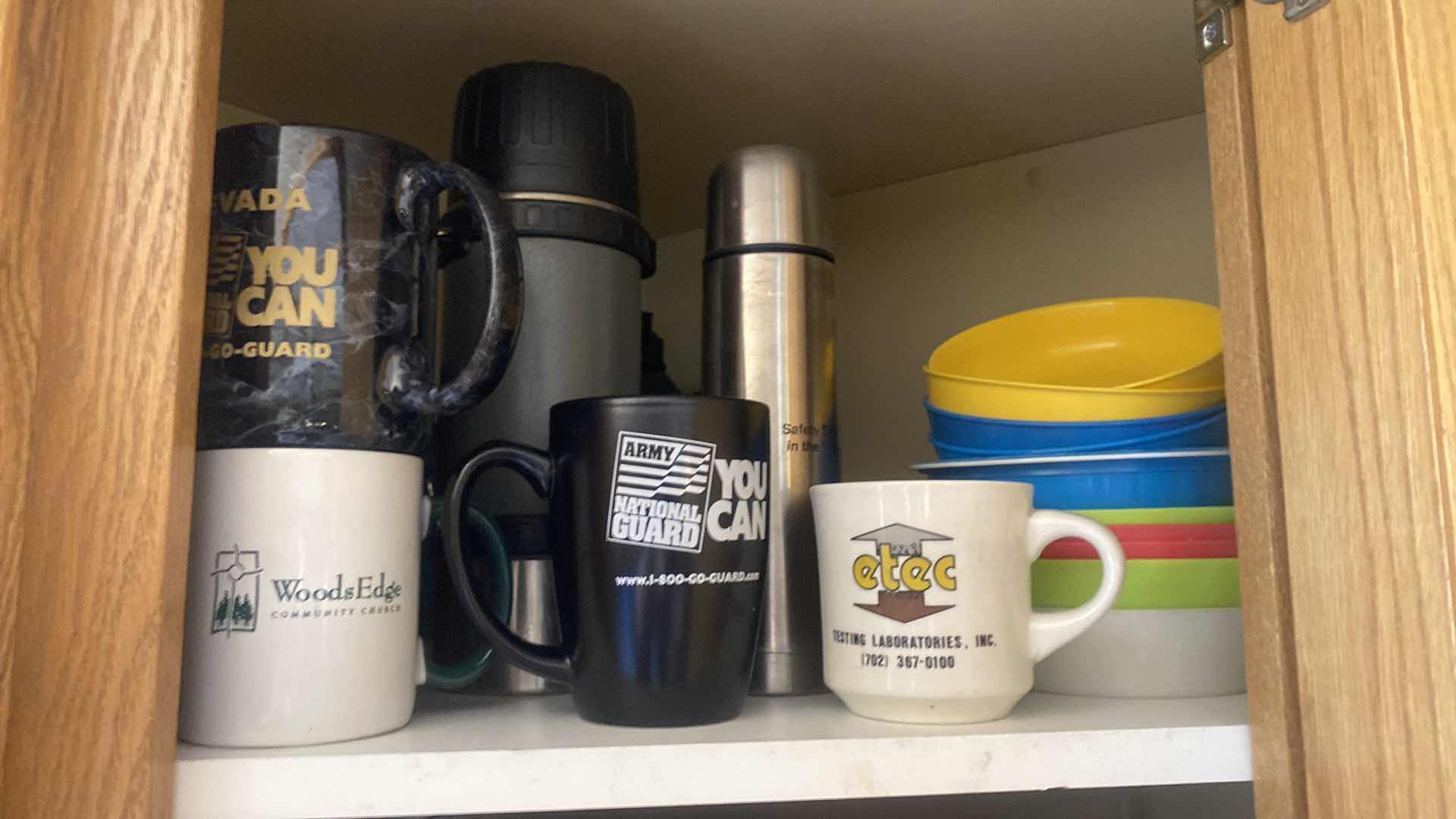 Photo 1 of CONTENTS OF KITCHEN CABINET - FONDUE, COFFEE CUPS & WATER BOTTLES