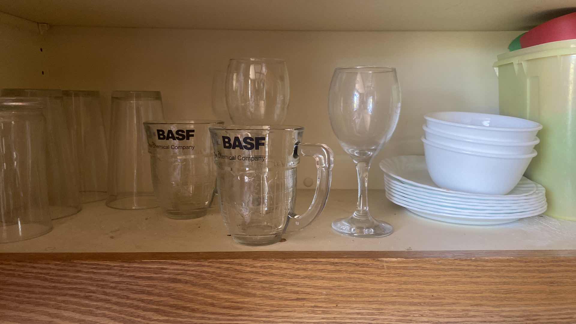 Photo 5 of CONTENTS OF KITCHEN CABINET - FIESTA PLATES & BOWLS & ASSORTED GLASSWARE