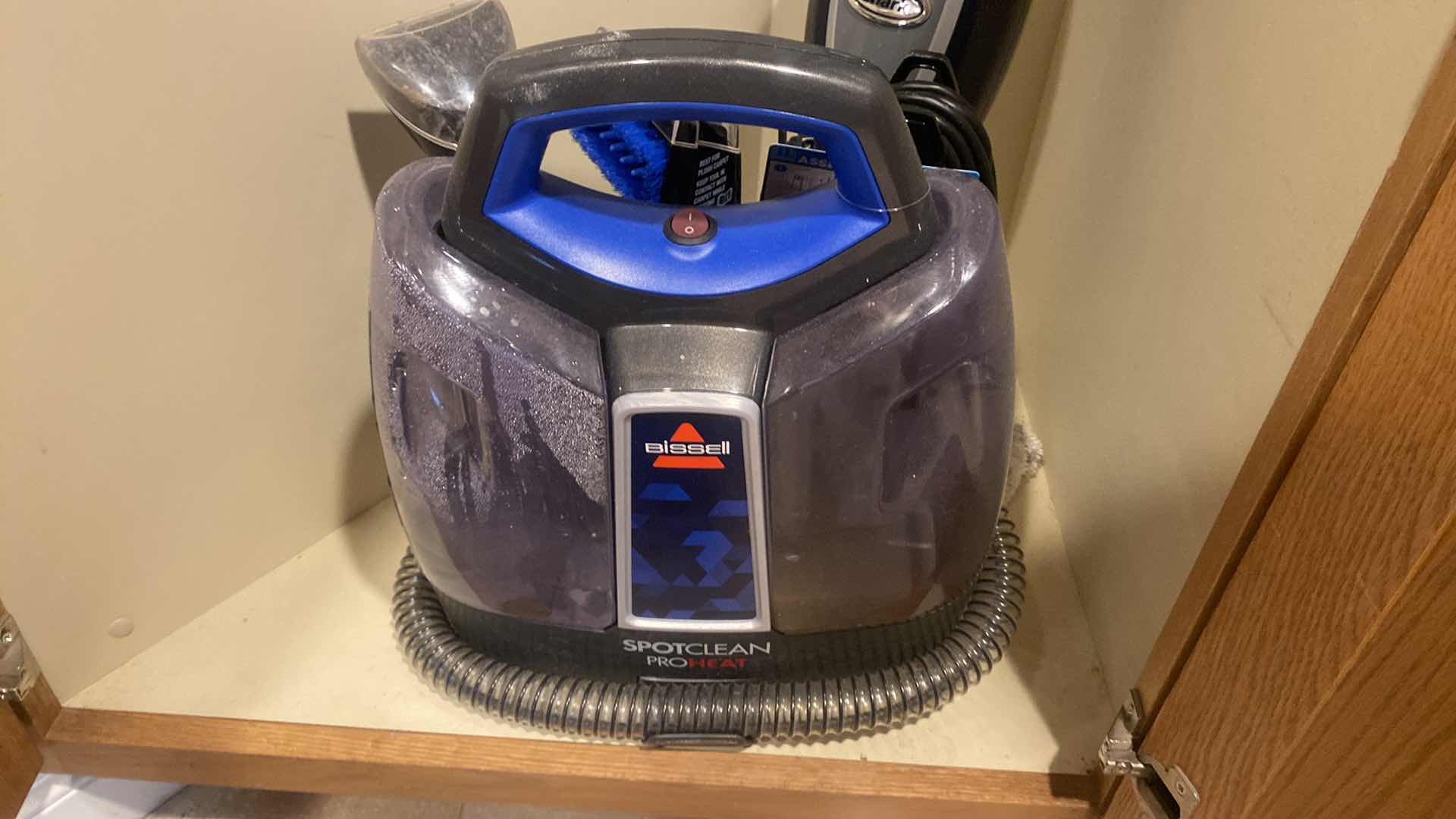 Photo 1 of CONTENTS KITCHEN CABINET - SHARK FLOOR STEAMER & BISSELL SPOTCLEAN PRO