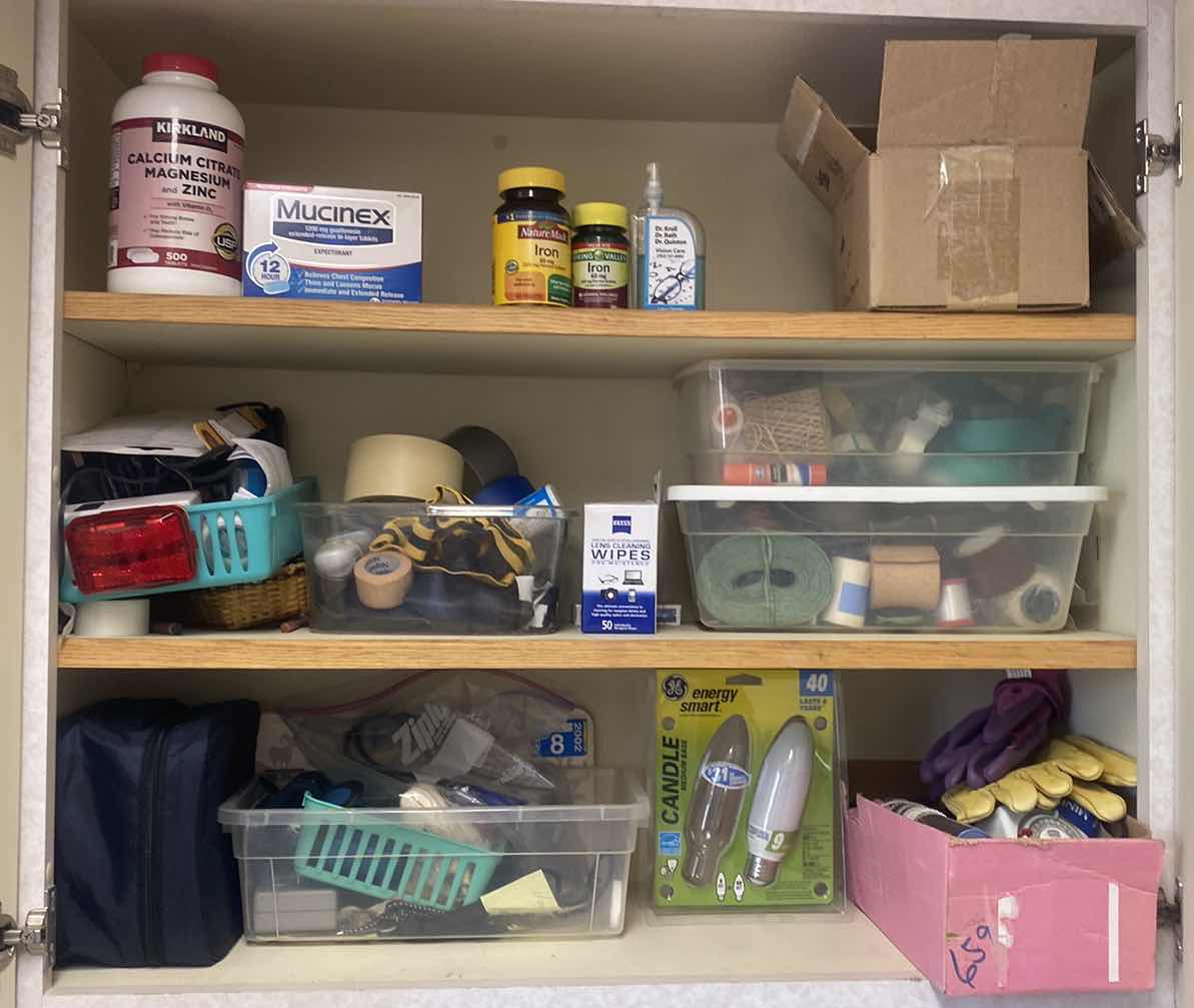 Photo 1 of CONTENTS OF LAUNDRY ROOM CABINET - ASSORTED HOUSEHOLD ITEMS