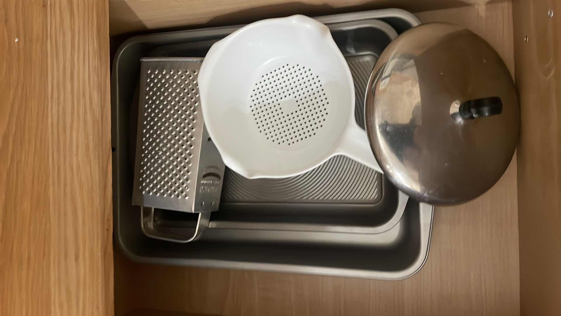 Photo 1 of CONTENTS OF BOTTOM CABINET