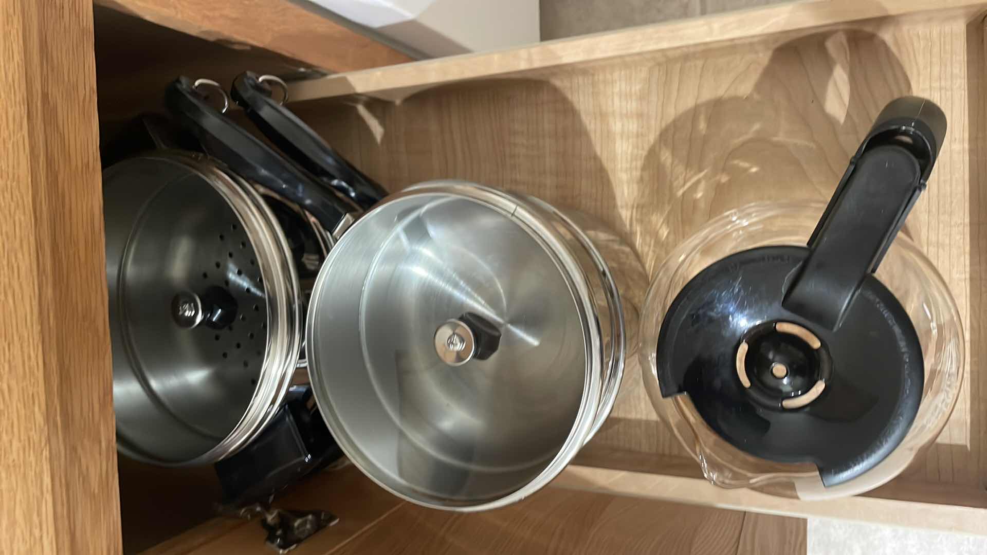 Photo 1 of CONTENTS OF LOWER CABINET