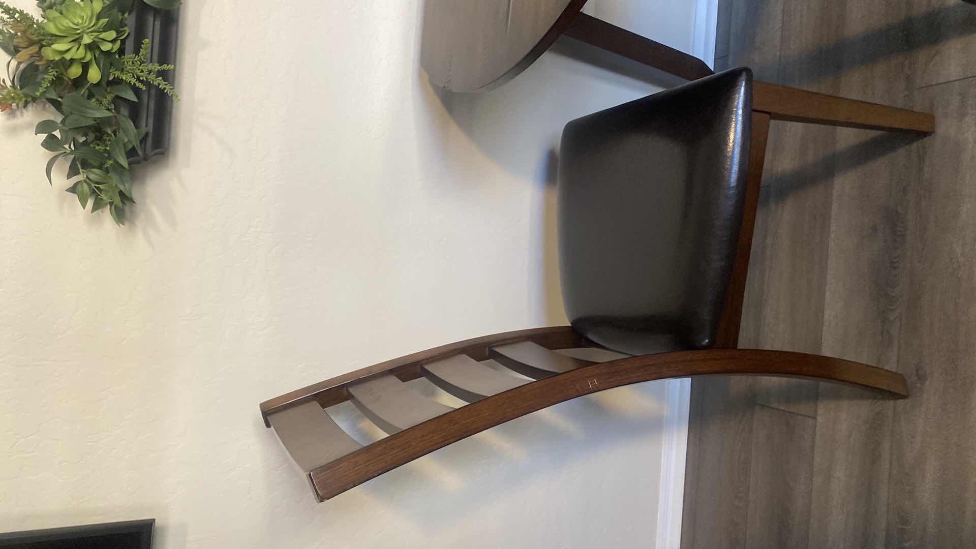 Photo 1 of DARK WOOD DINING TABLE WITHOUT SIDES EXTENDED 42“ x 24” H30“, EXTENDED 41” ROUND WITH 2 CHAIRS