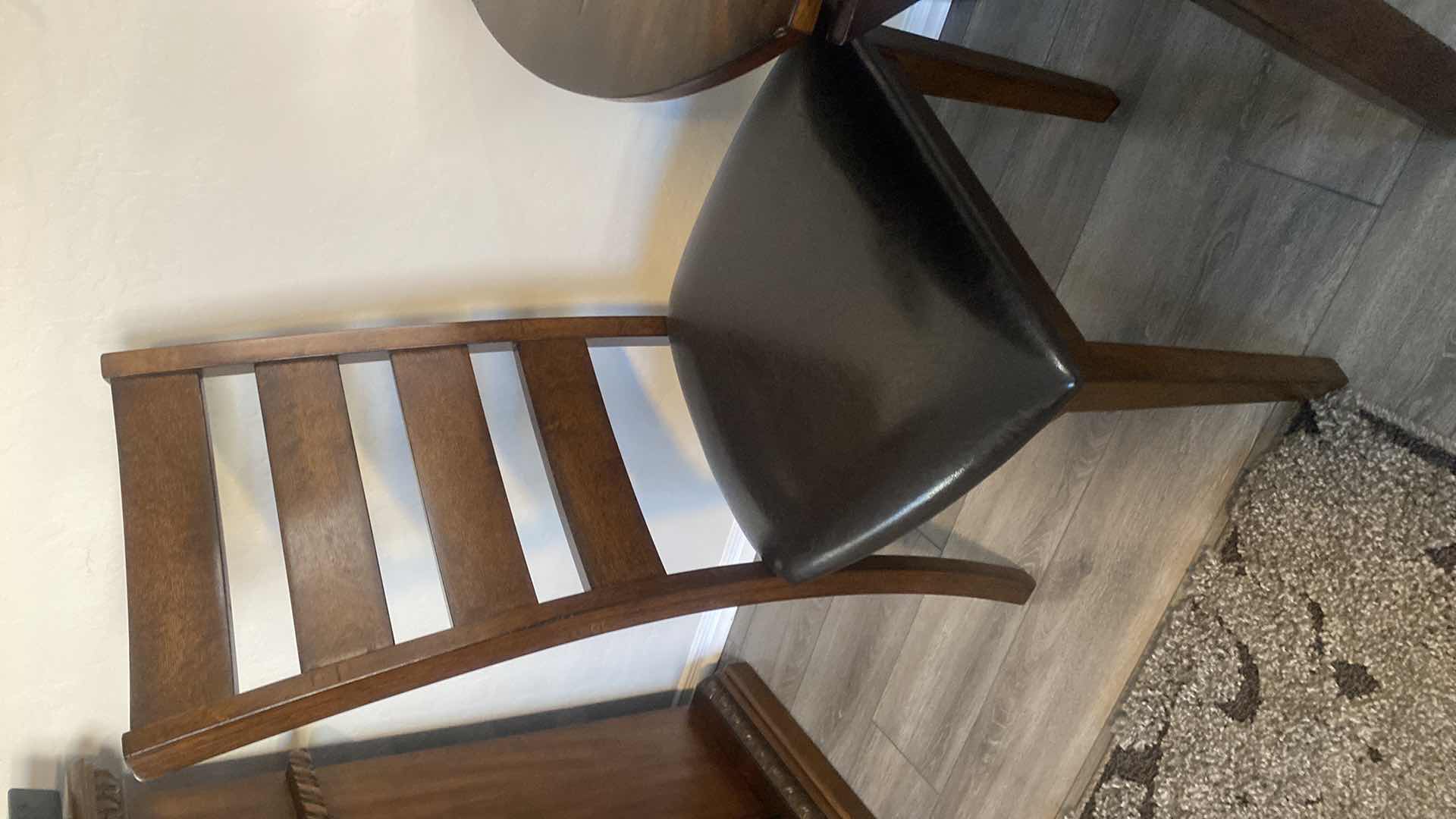 Photo 1 of DARK WOOD DINING TABLE WITHOUT SIDES EXTENDED 42“ x 24” H30“, EXTENDED 41” ROUND WITH 2 CHAIRS