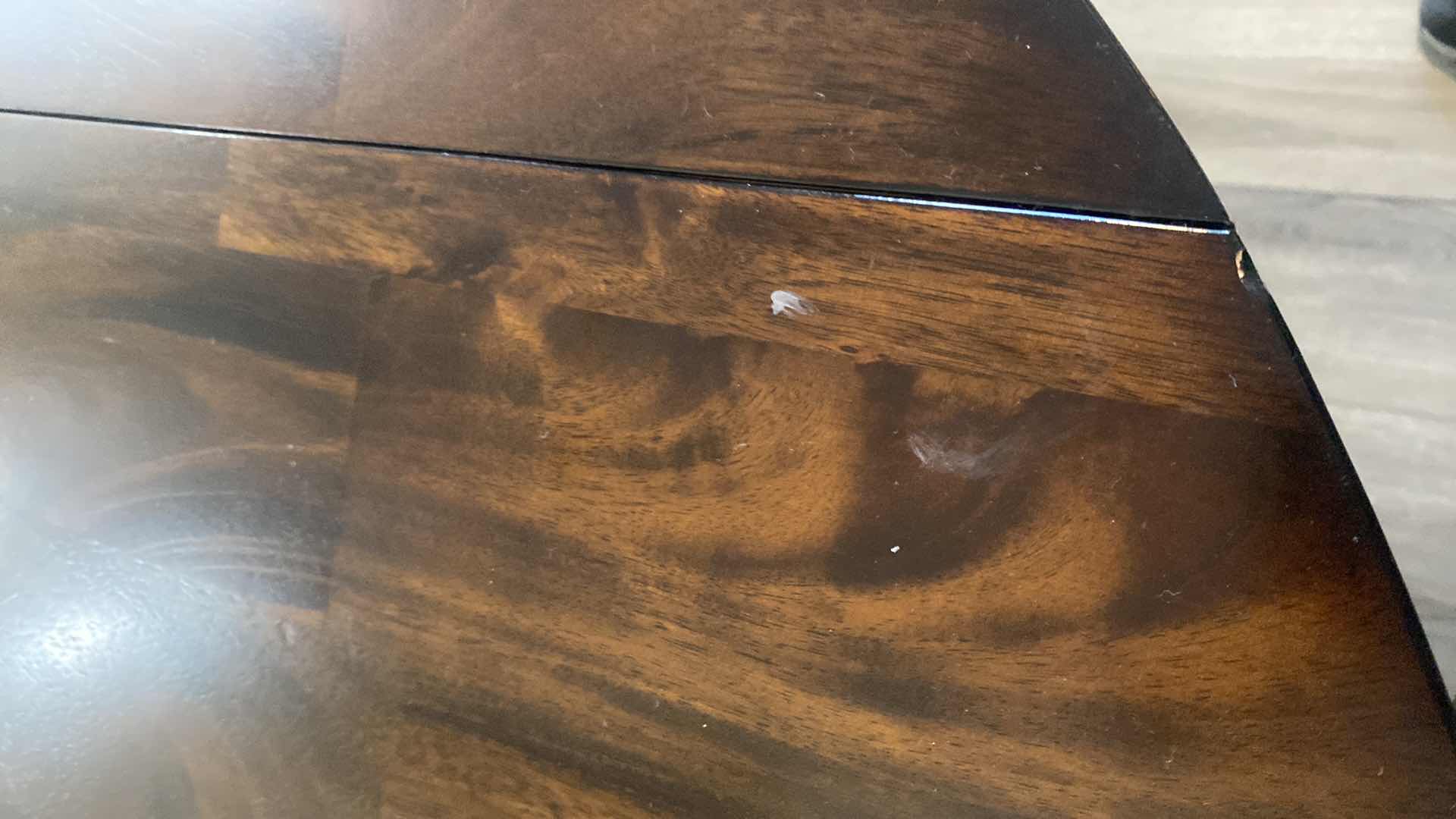 Photo 1 of DARK WOOD DINING TABLE WITHOUT SIDES EXTENDED 42“ x 24” H30“, EXTENDED 41” ROUND WITH 2 CHAIRS