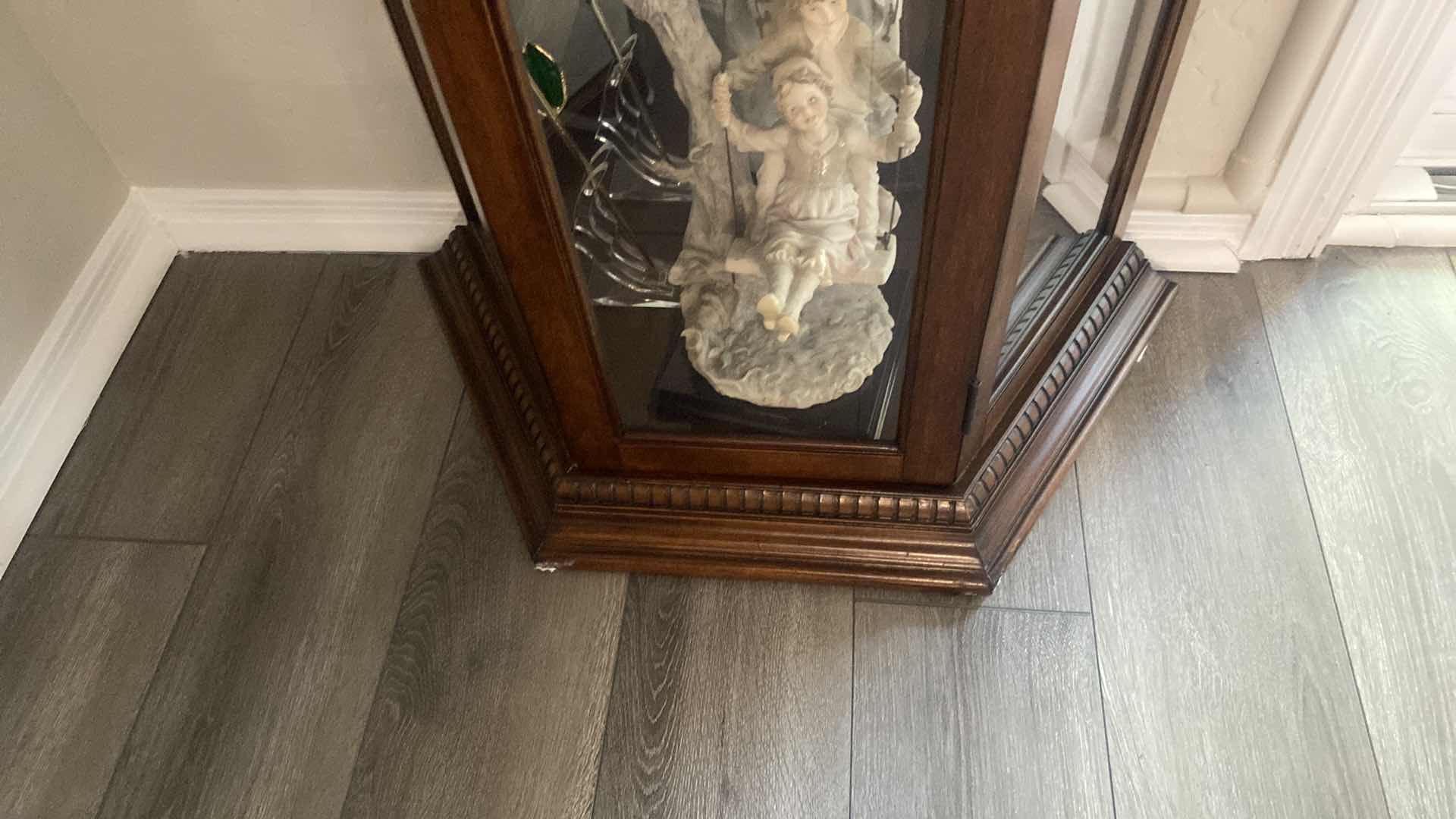 Photo 1 of DARK WOOD DISPLAY CABINET WITH 3 GLASS ADJUSTABLE SHELVES 24“ x 11 1/2“ H 69”