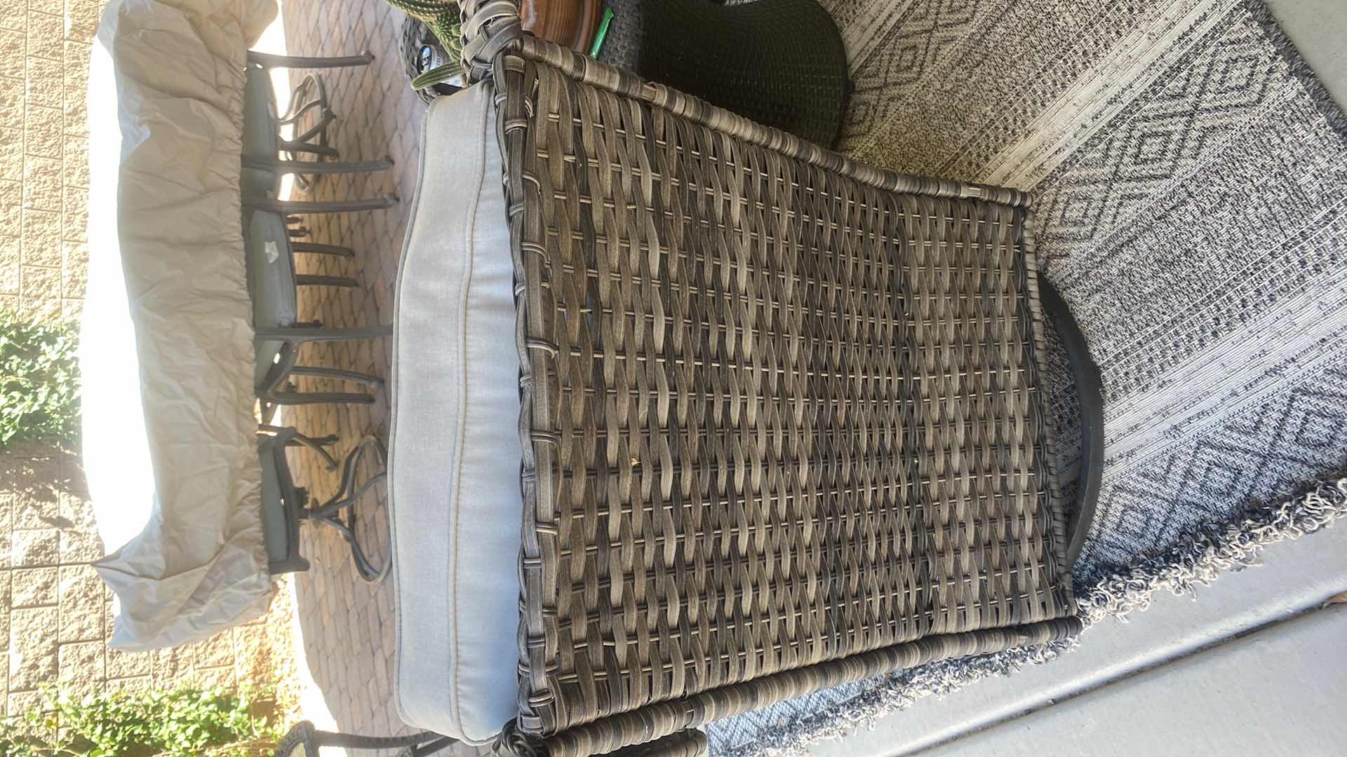 Photo 1 of RATTAN SWIVEL PATIO CHAIR WITH CUSHION (2 Available sold separately) chair cover included