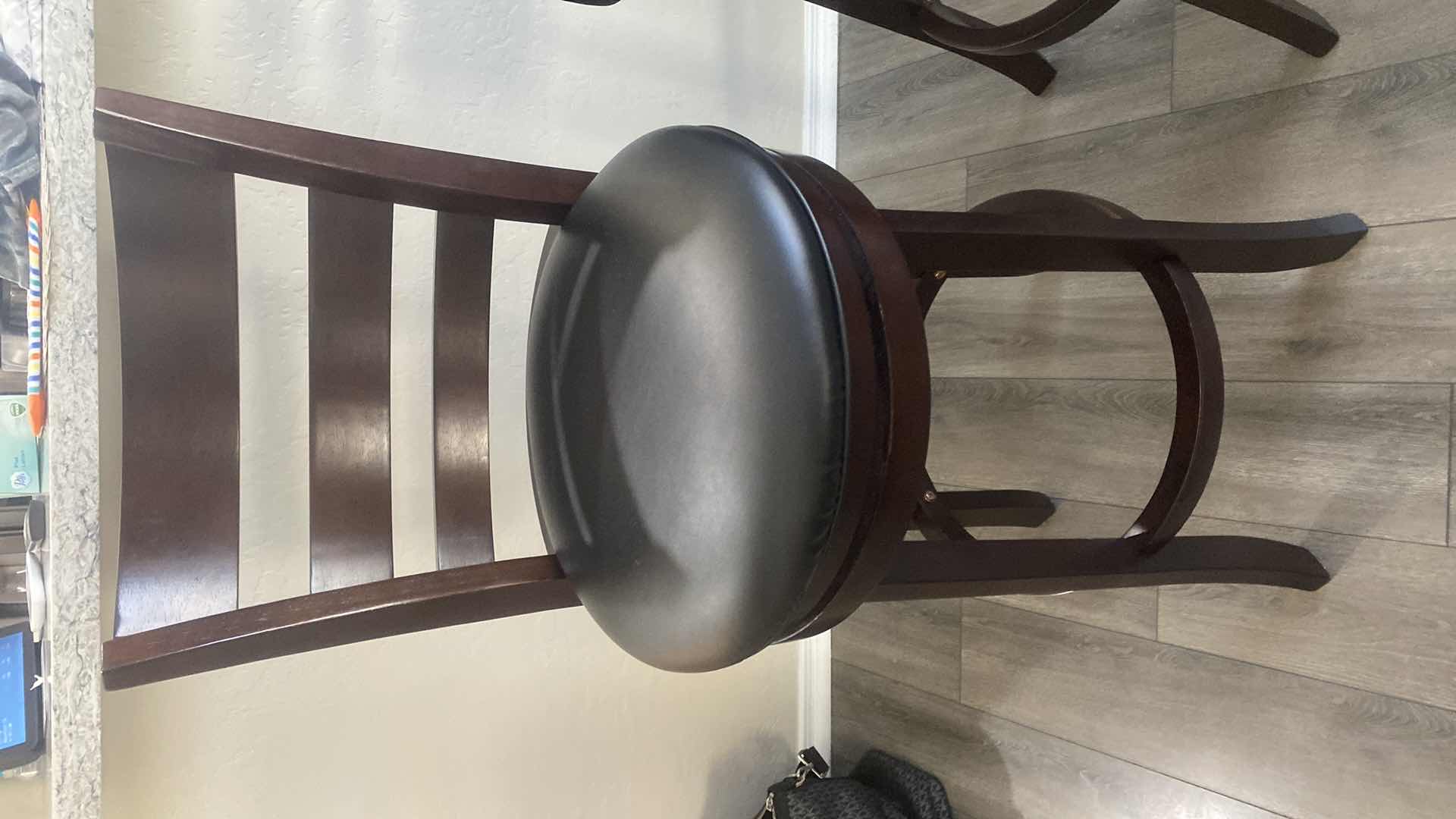 Photo 1 of 2-DARK WOOD SWIVEL BAR STOOLS WITH BLSCK SEATS, SEAT H30” OVERALL H42”