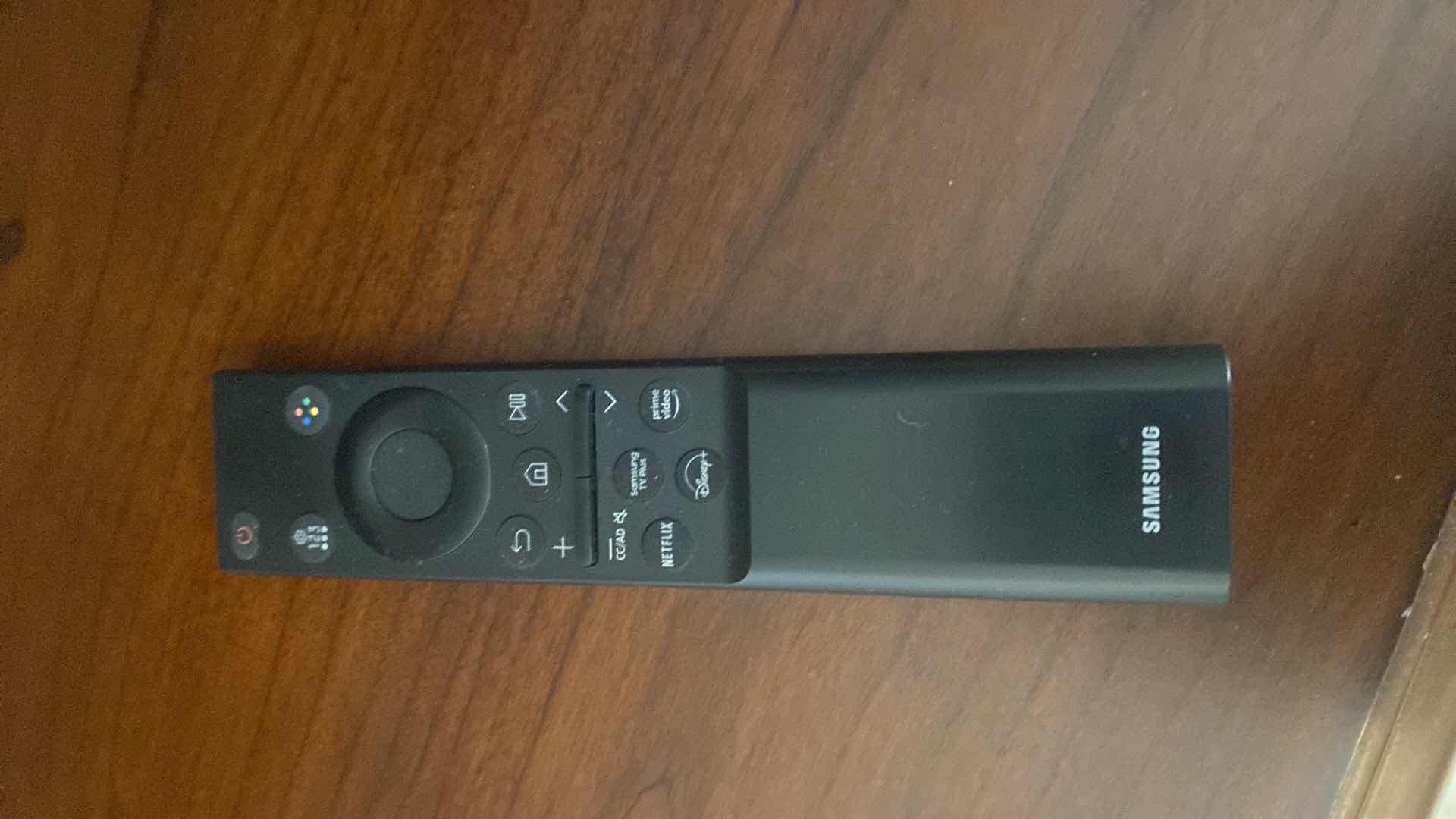 Photo 1 of 65” SAMSUNG. SMART TV WITH REMOTE AND STAND