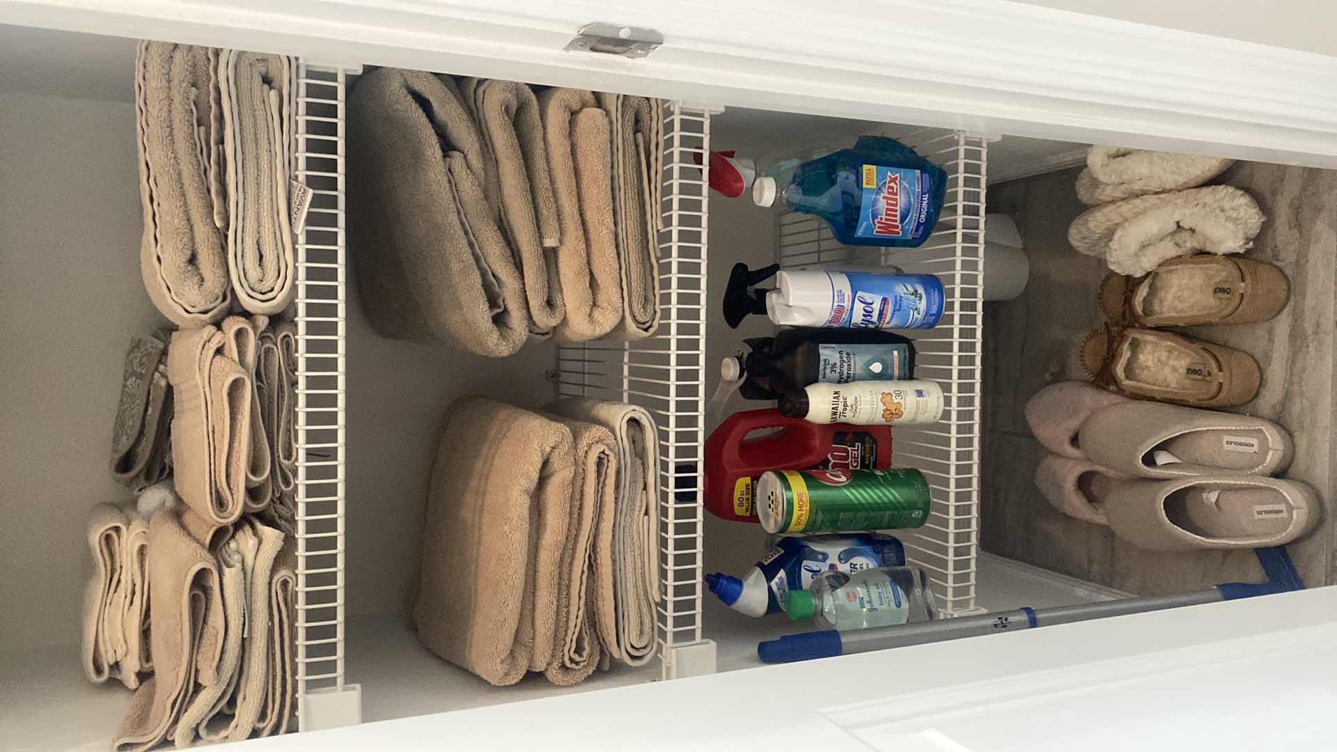 Photo 1 of CONTENTS OF CLOSET 3 SHELVES & FLOOR- TOWELS SLIPPERS & CLEANING