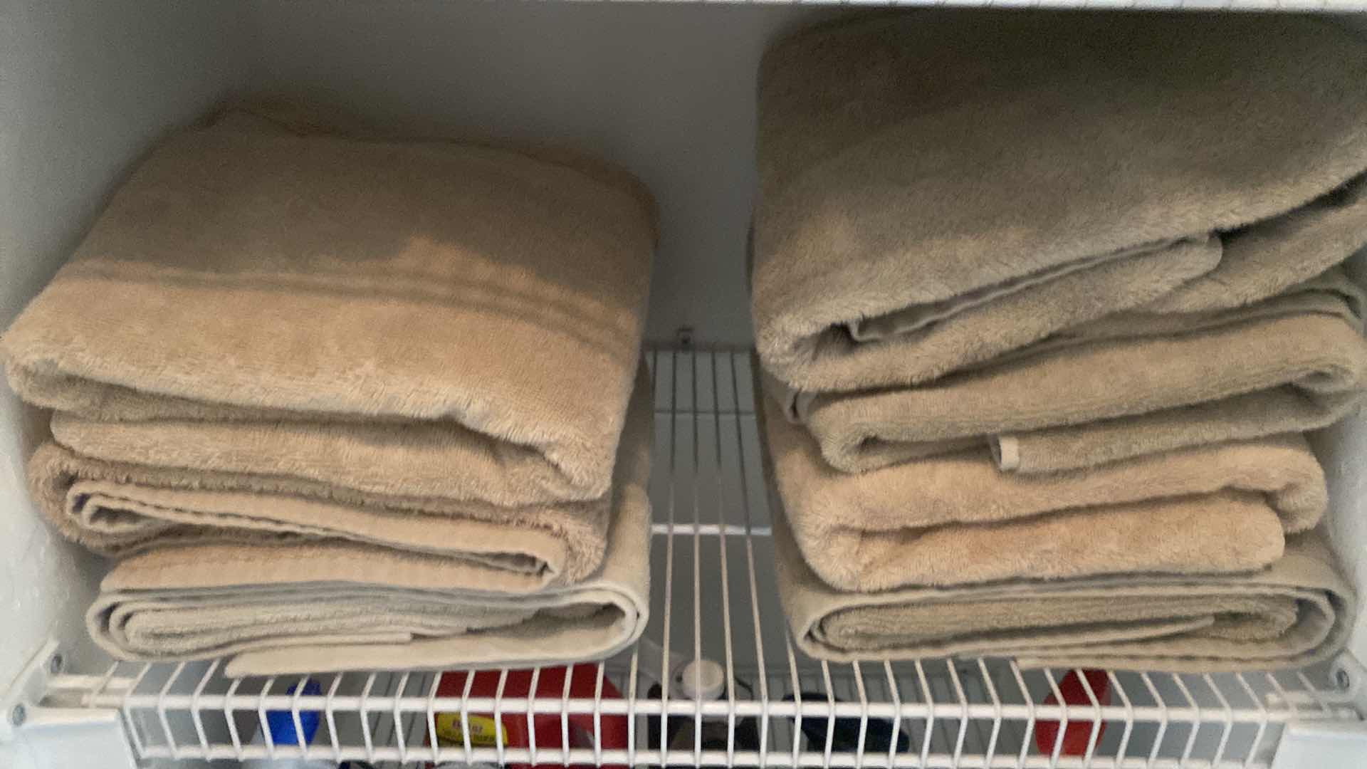 Photo 1 of CONTENTS OF CLOSET 3 SHELVES & FLOOR- TOWELS SLIPPERS & CLEANING