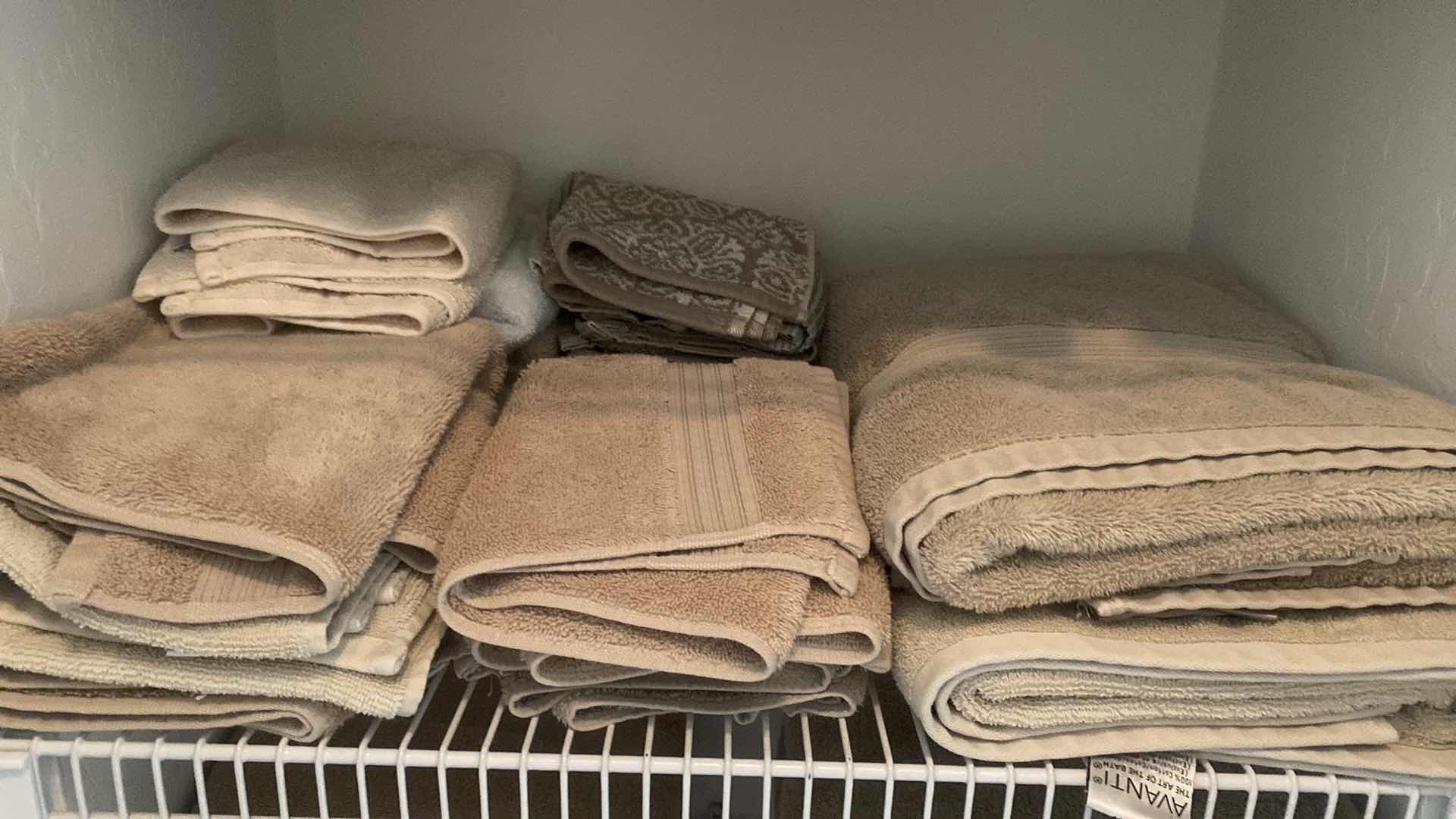 Photo 1 of CONTENTS OF CLOSET 3 SHELVES & FLOOR- TOWELS SLIPPERS & CLEANING