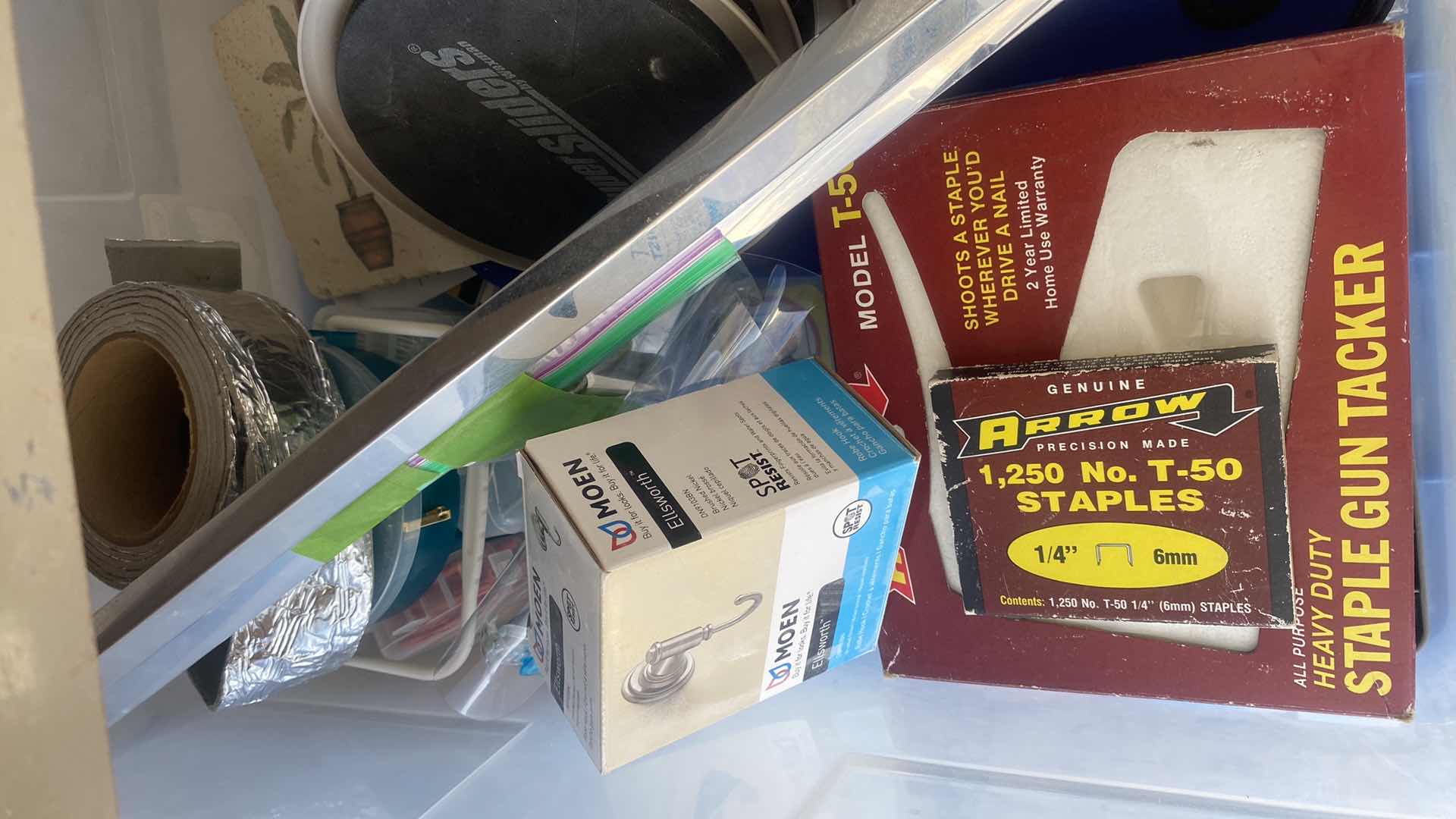 Photo 1 of SHELF IN GARAGE - ELECTRICAL FASTENERS STAPLER & MORE