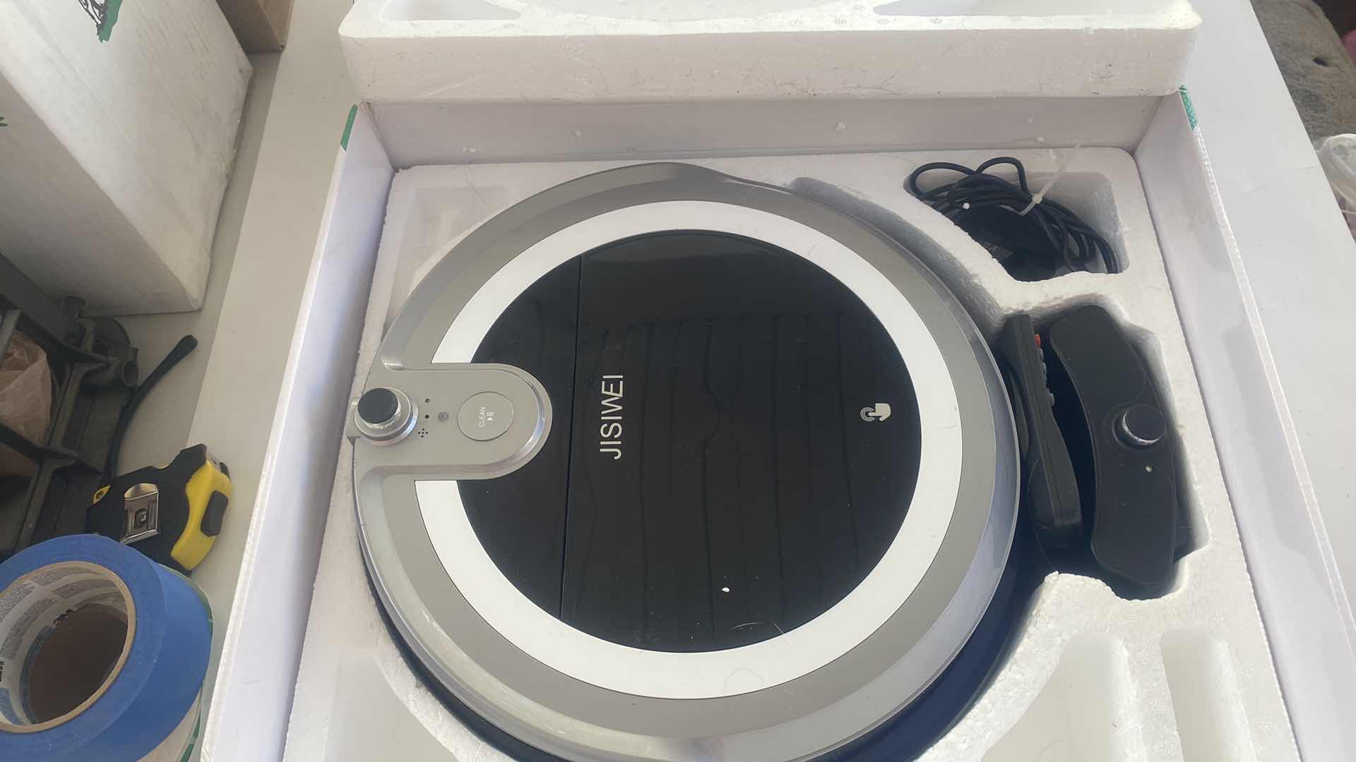 Photo 1 of JISIWEI SMART VACUUM CLEANING ROBOT