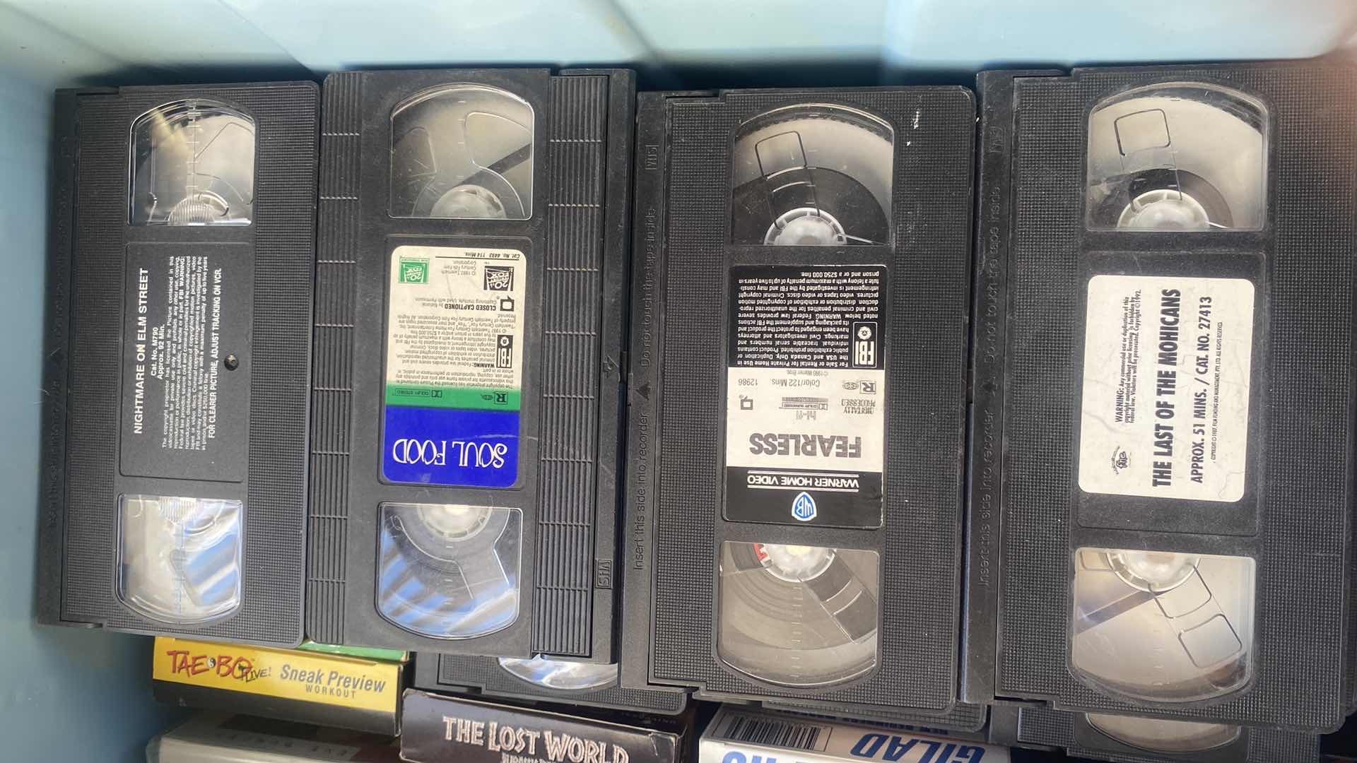Photo 1 of 2-TOTES VHS TAPES VARIOUS MOVIES & FITNESS
