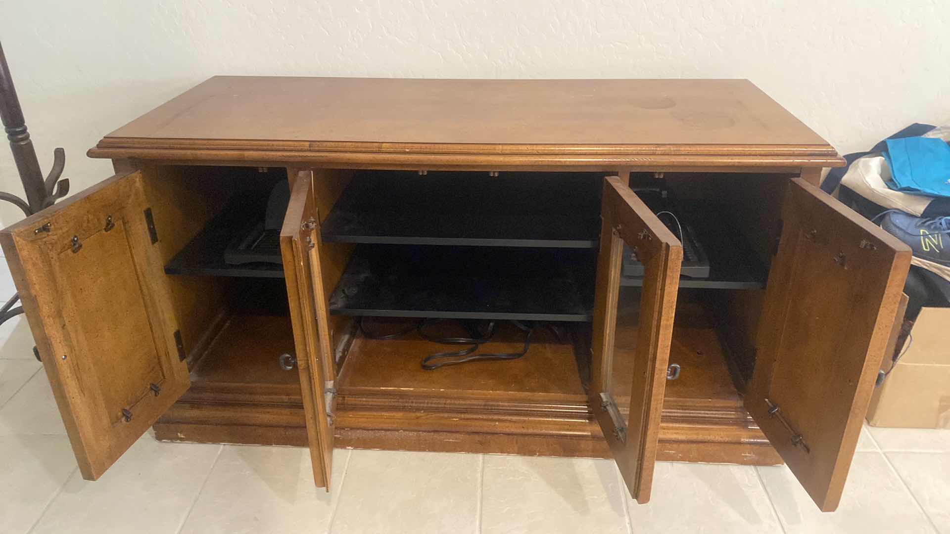 Photo 1 of 4 DOOR ENTERTAINMENT CENTER WITH CD STORAGE 56” x 22” H 29 1/2”