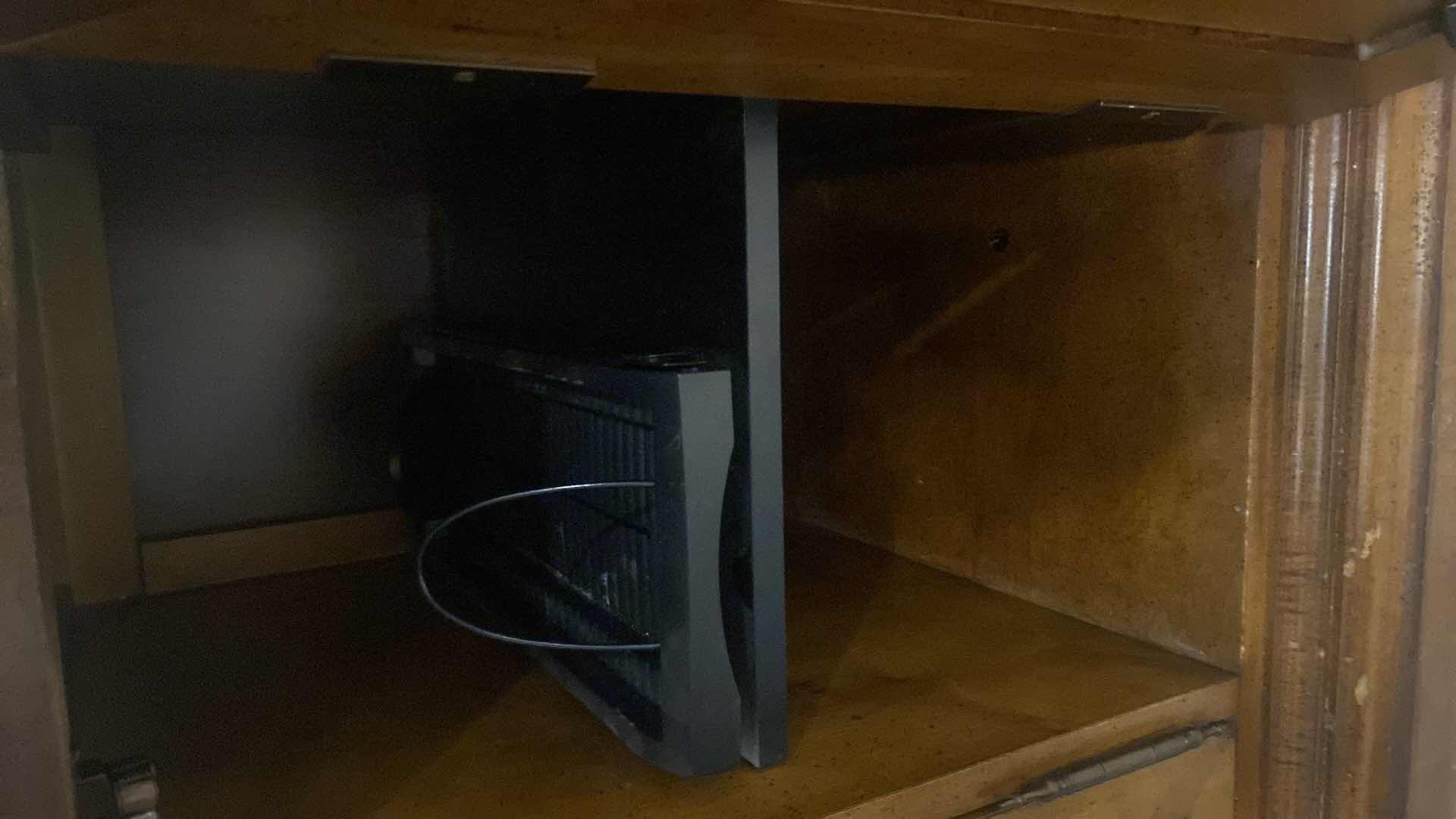 Photo 1 of 4 DOOR ENTERTAINMENT CENTER WITH CD STORAGE 56” x 22” H 29 1/2”