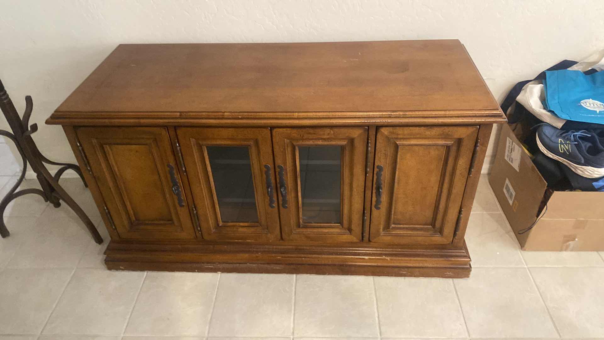 Photo 1 of 4 DOOR ENTERTAINMENT CENTER WITH CD STORAGE 56” x 22” H 29 1/2”