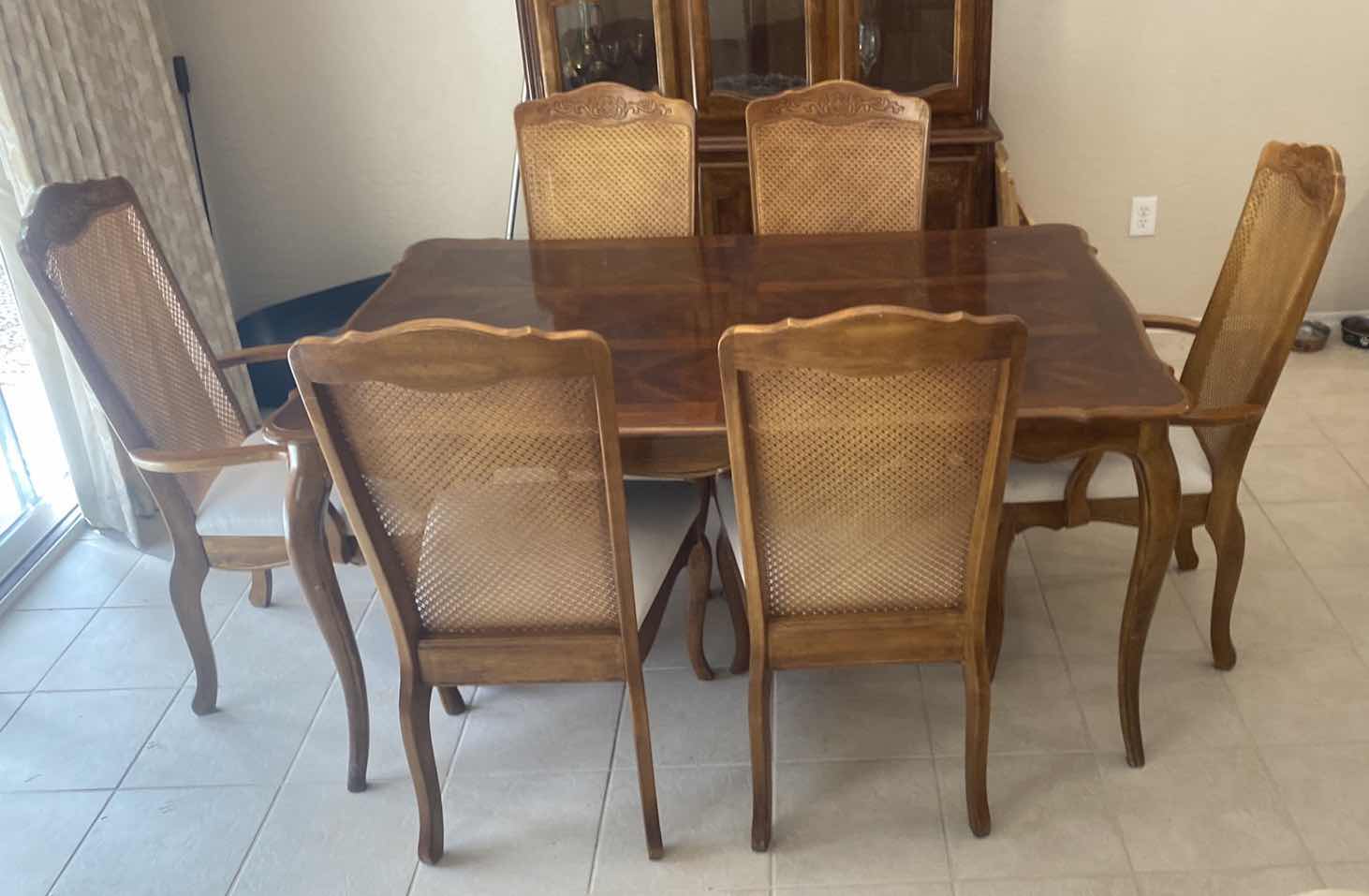 View 1 of WOOD TRADITIONAL DINING TABLE 59” x 39” H 30” + 2 12” LEAFS & 6 CANE BACK UPHOLSTERED CHAIRS MANUFACTURED IN TAIWAN (matching China hutch available sold separately)