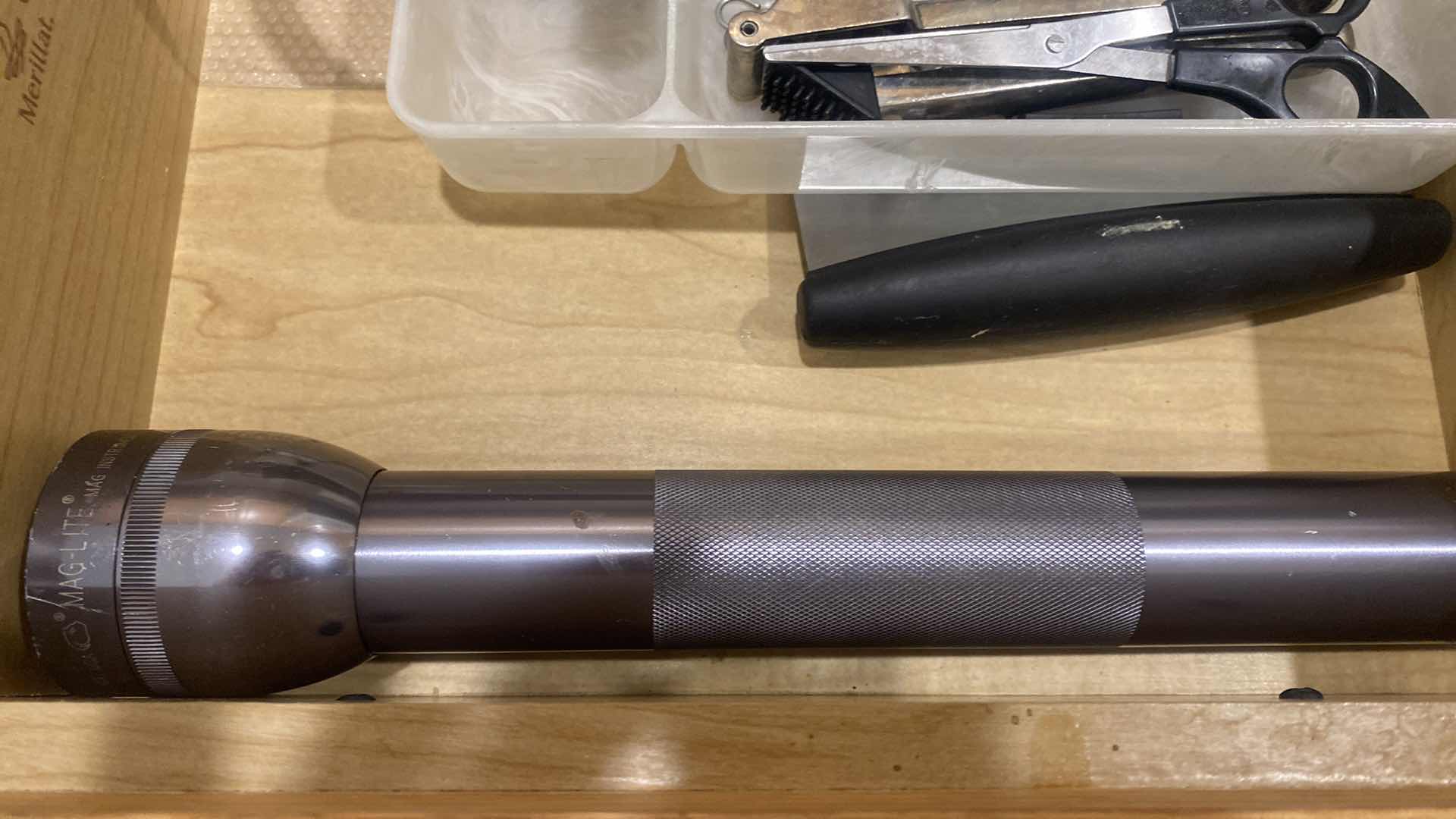 Photo 1 of CONTENTS OF KITCHEN CABINET- LARGE FLASHLIGHT & STEAK KNIVES