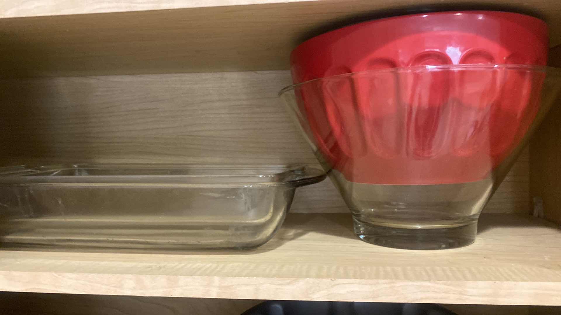 Photo 1 of CONTENTS OF KITCHEN CABINET-BOWLS & PYREX RECTANGULAR BAKEWARE