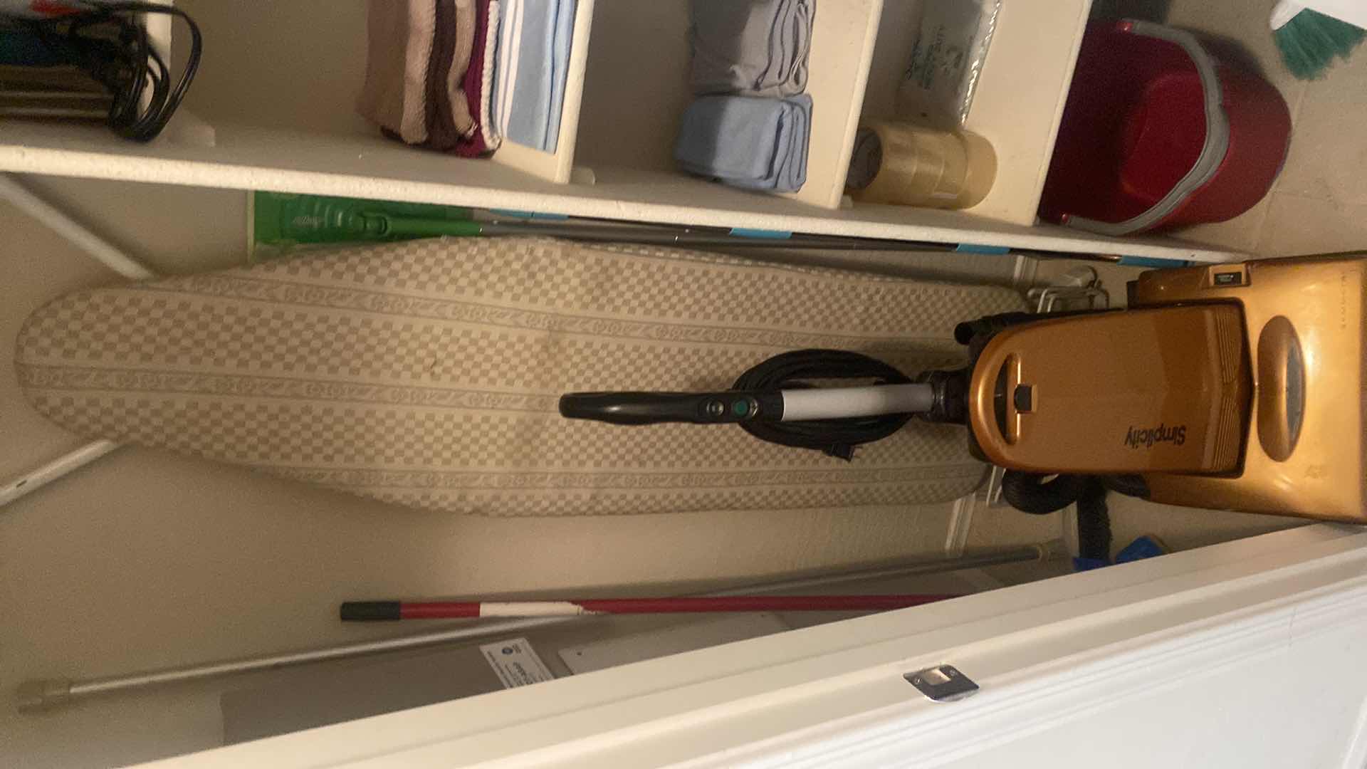 Photo 1 of HALL CLOSET- SIMPLICITY VACUUM IRONING BOARD CLEANING TOOLS & SUPPLIES