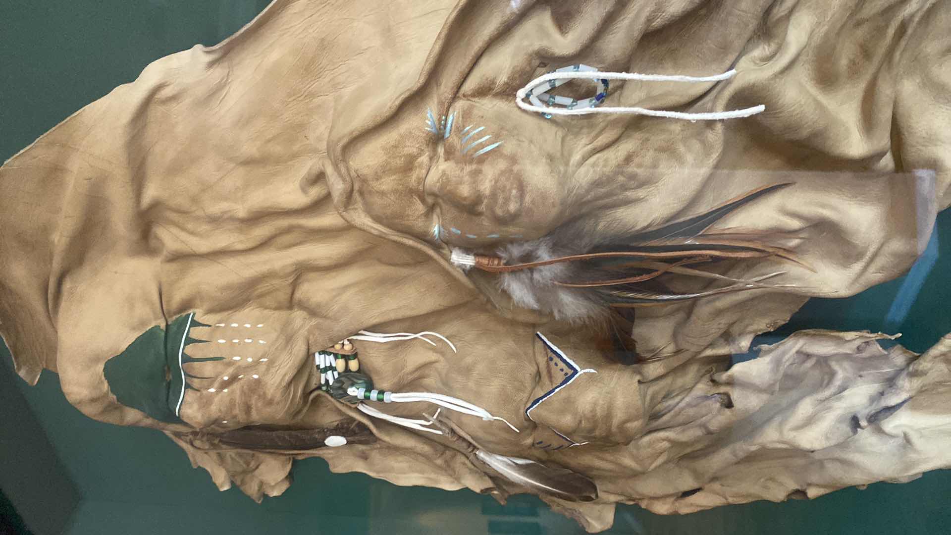 Photo 1 of FRAMED NATIVE AMERICAN 3 FACES LEATHER SCULPTURE ARTWORK 27 1/2” x 30 1/2”