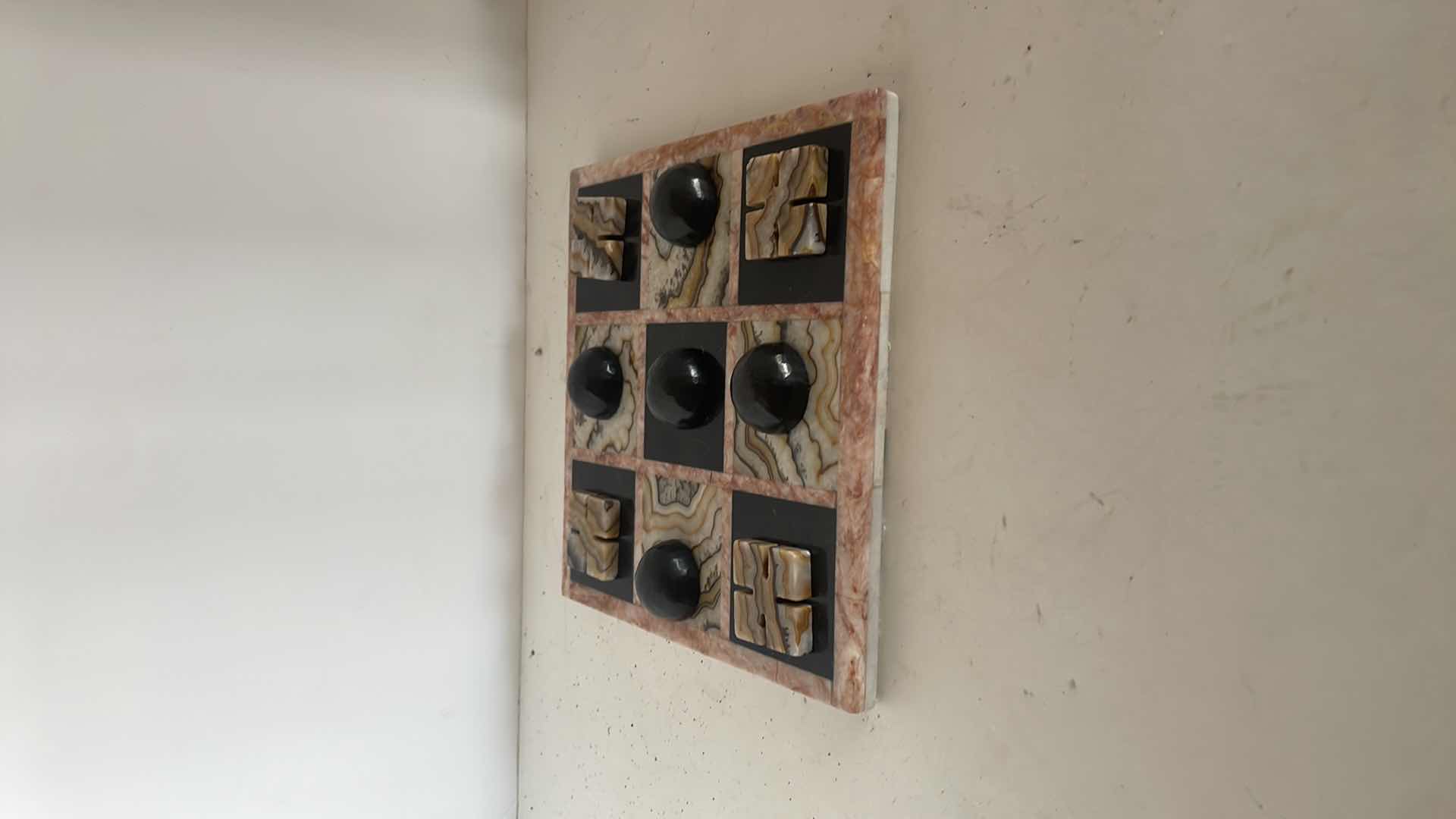 Photo 1 of HAND CARVED STONE GAME BOARD 8”Wx8”H