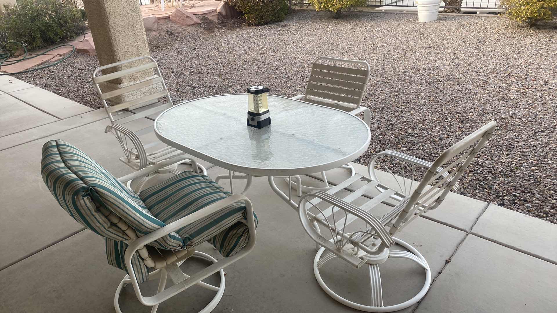 Photo 1 of 5 PIECE PATIO SET ALUMINUM GLASS TOP OVAL TABLE & 4 SWIVEL CHAIRS 55” x 38” H28”