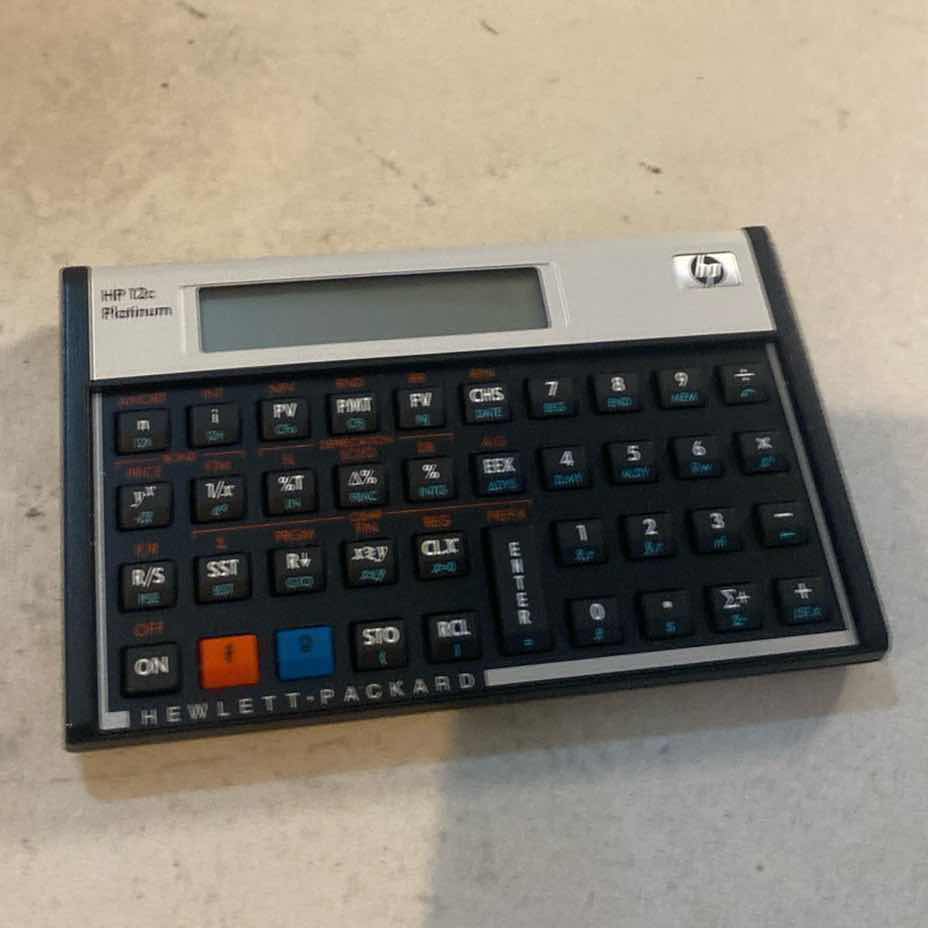 Photo 1 of HP 12C FINANCIAL CALCULATOR WITH CASE & CD