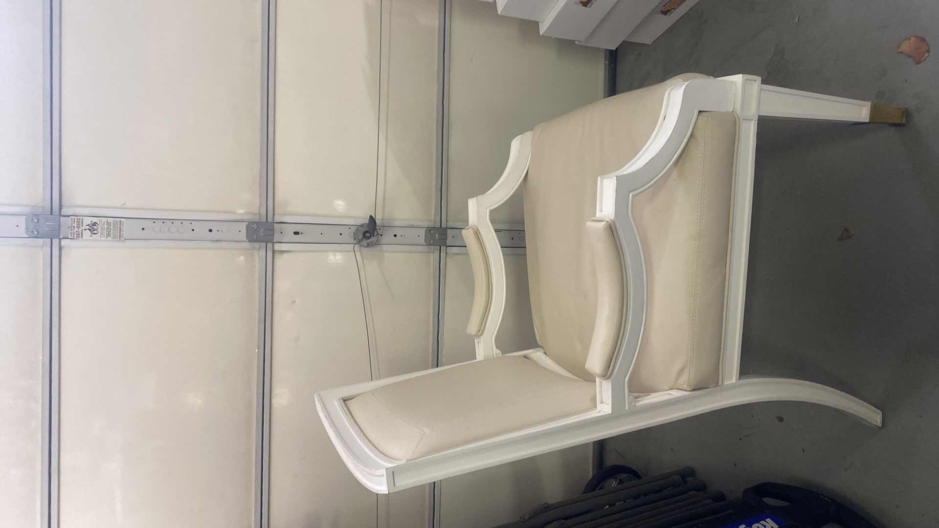 Photo 1 of BONDED LEATHER WITH WHITE WOOD AND GOLD TRIM ARMCHAIR FROM WYNN RESORT