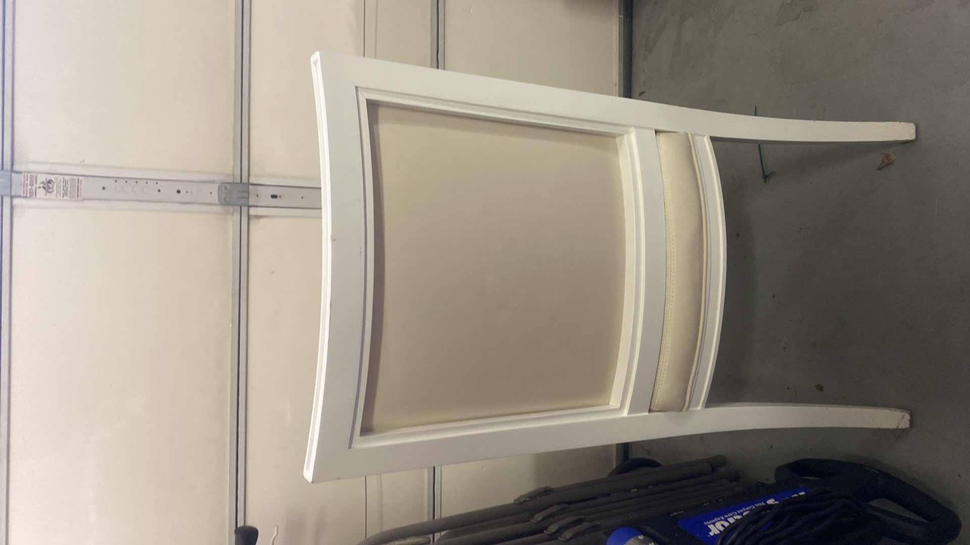 Photo 1 of BONDED LEATHER WITH WHITE WOOD AND GOLD TRIM ARMCHAIR FROM WYNN RESORT