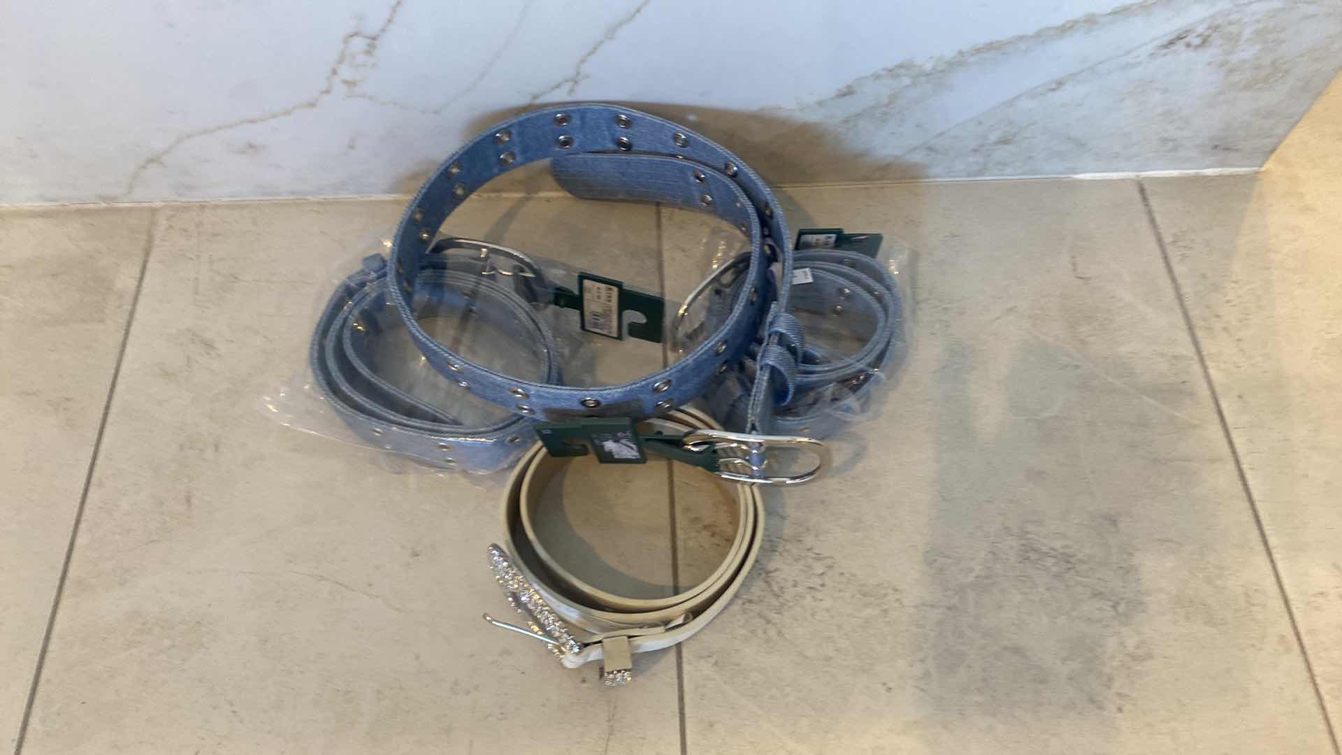 Photo 1 of NEW 4 WOMENS BELTS SIZE X SMALL