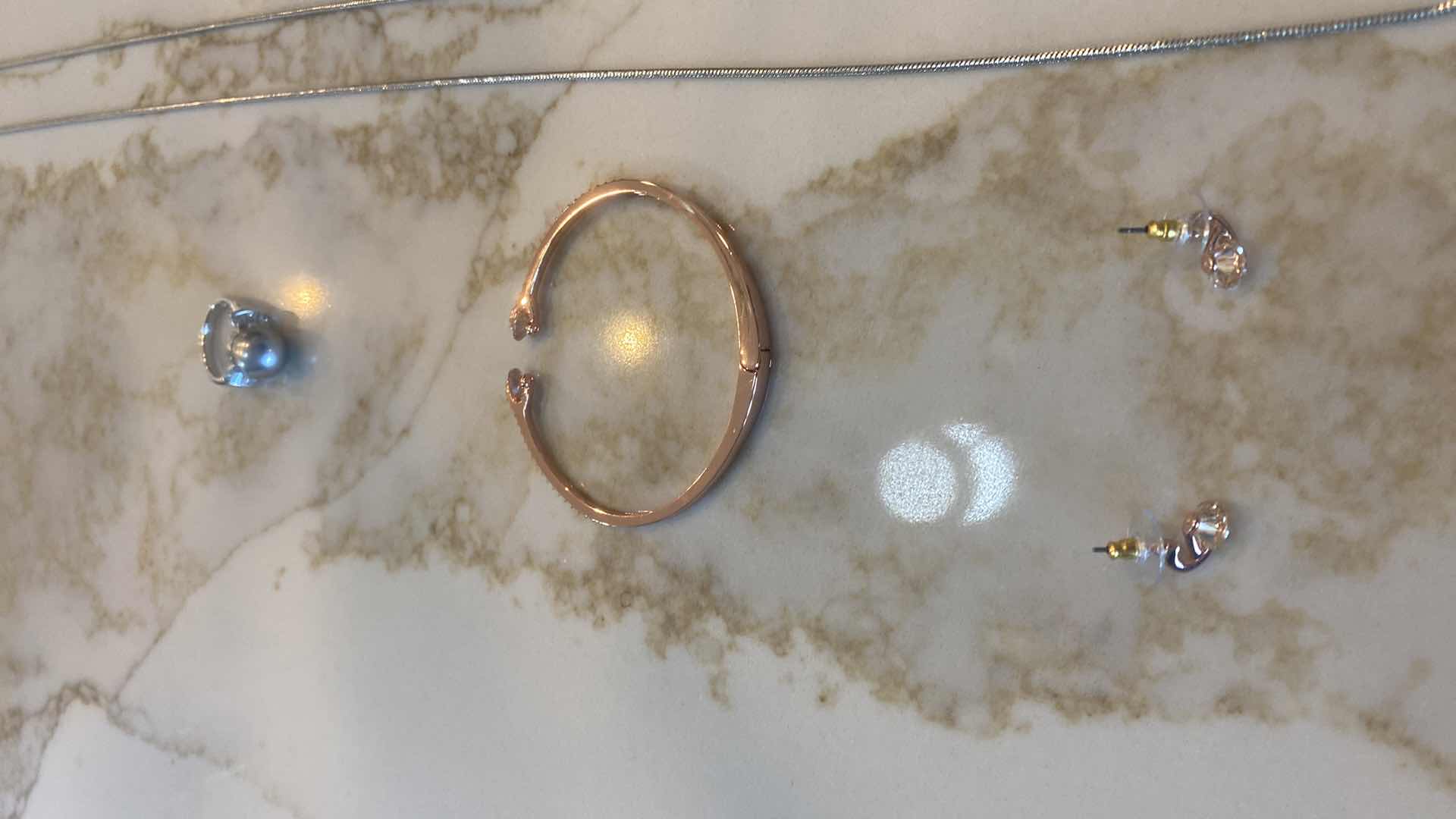 Photo 1 of 5 COSTUME JEWELRY (LONG HEART NECKLACE $89 FROM LEMON TREE)