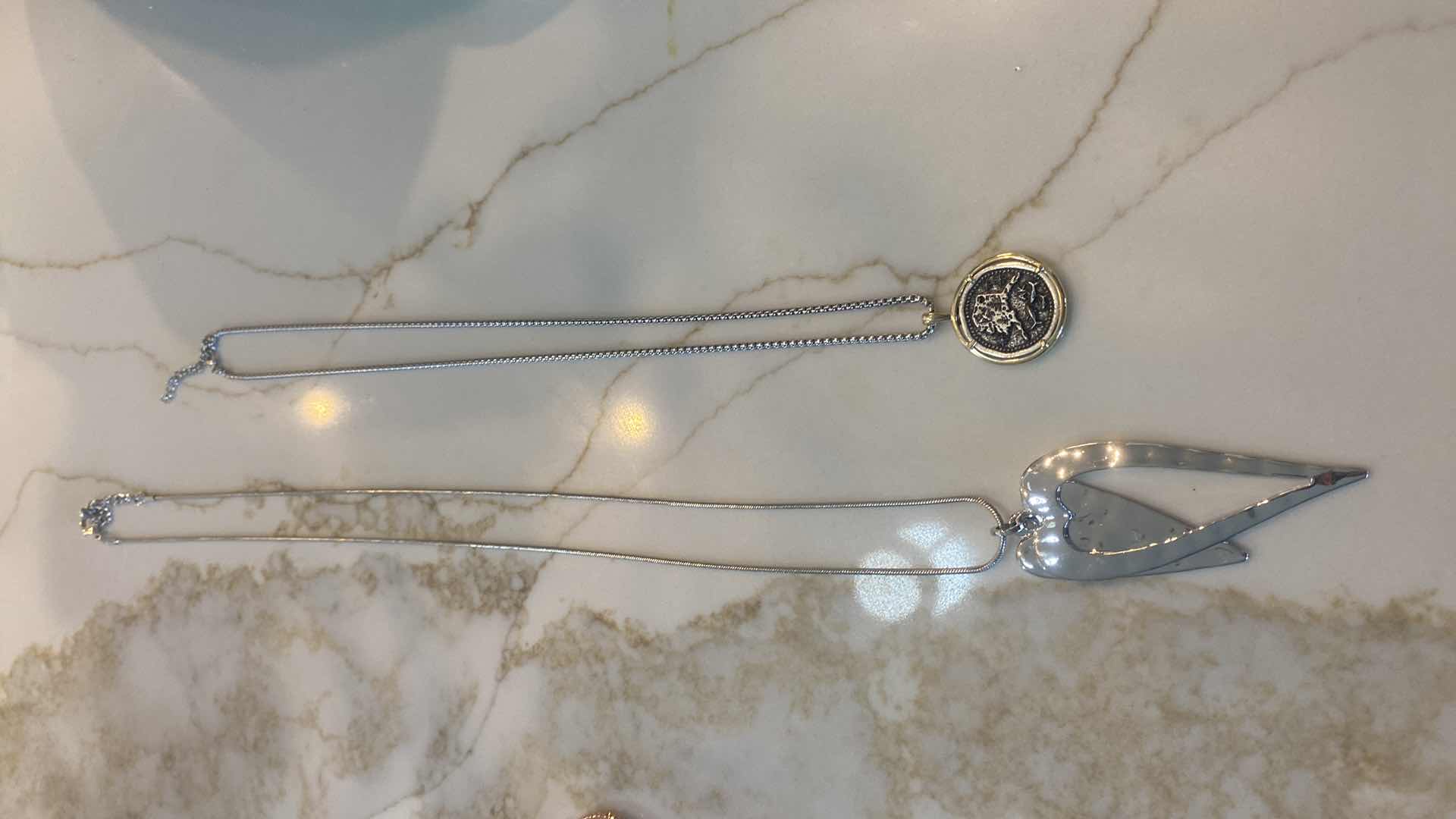 Photo 1 of 5 COSTUME JEWELRY (LONG HEART NECKLACE $89 FROM LEMON TREE)