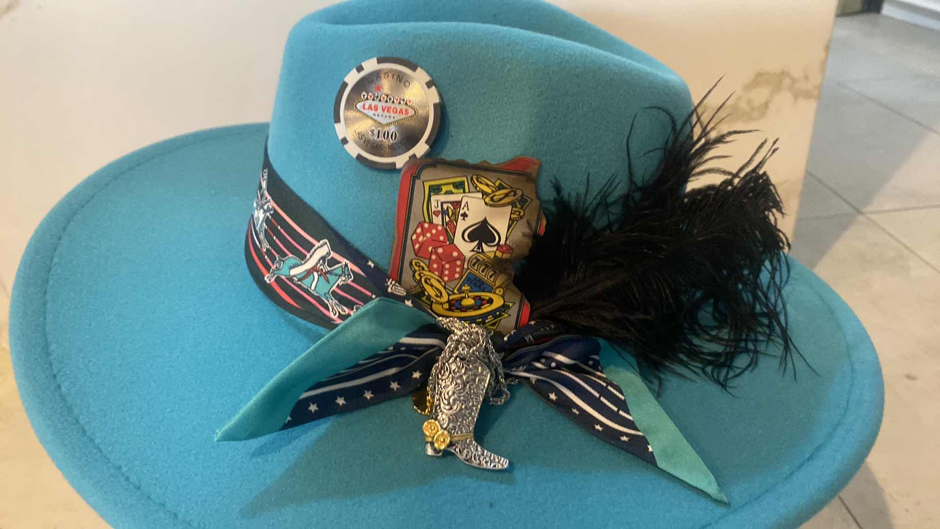 Photo 1 of NEW - CUSTOM DECORATED LAKE BLUE CASINO THEME FEDORA HAT WITH REMOVABLE CARD & FEATHER - ADJUSTABLE WITH INTERIOR RIBBON - TIE TO FIT