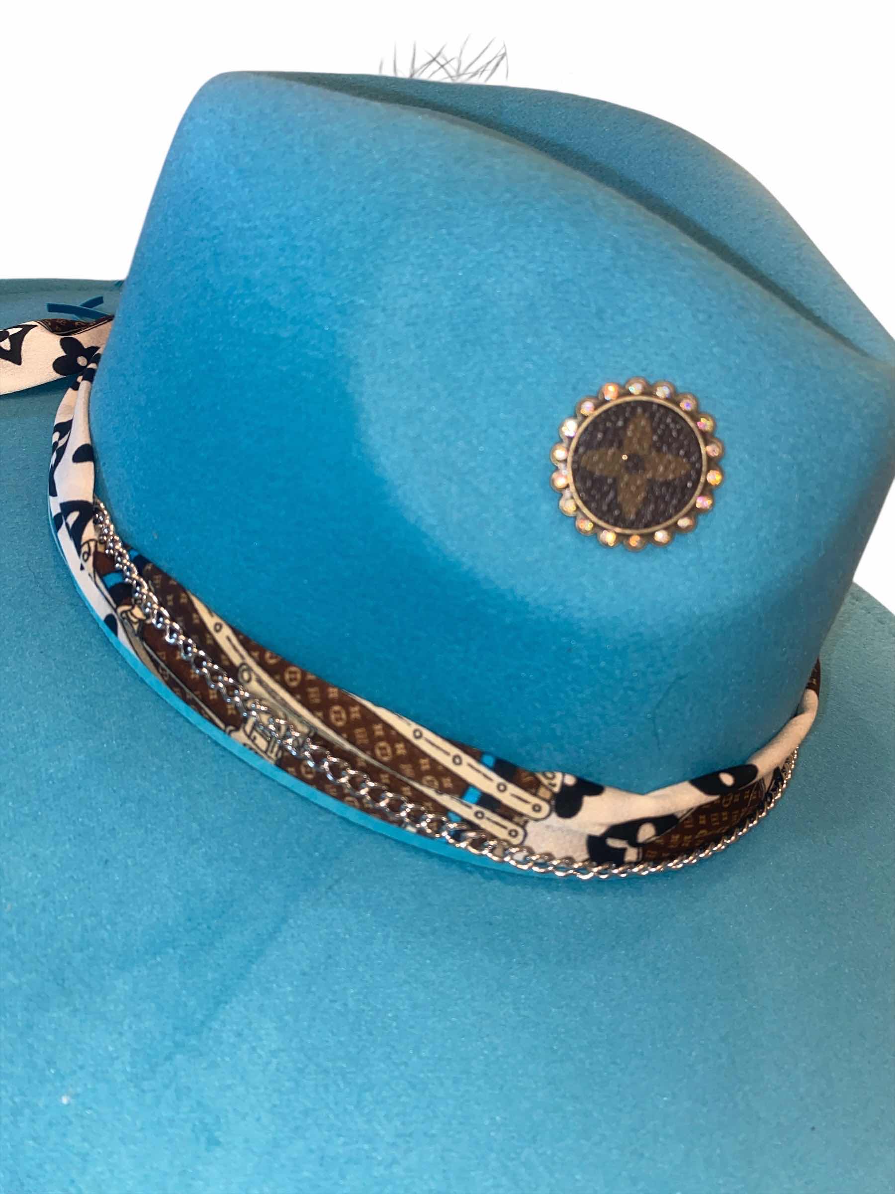 Photo 1 of NEW - CUSTOM DECORATED LAKE BLUE FEDORA HAT WITH UPCYCLED LOUIS VUITTON MONOGRAM EMBELLISHMENTS FEATHERS  - ADJUSTABLE WITH INTERIOR RIBBON - TIE TO FIT