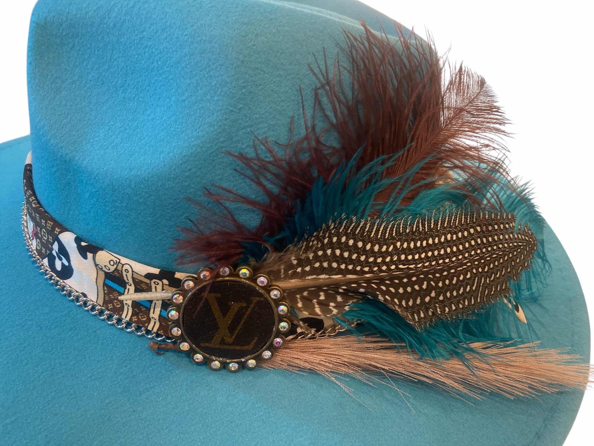 Photo 1 of NEW - CUSTOM DECORATED LAKE BLUE FEDORA HAT WITH UPCYCLED LOUIS VUITTON MONOGRAM EMBELLISHMENTS FEATHERS  - ADJUSTABLE WITH INTERIOR RIBBON - TIE TO FIT
