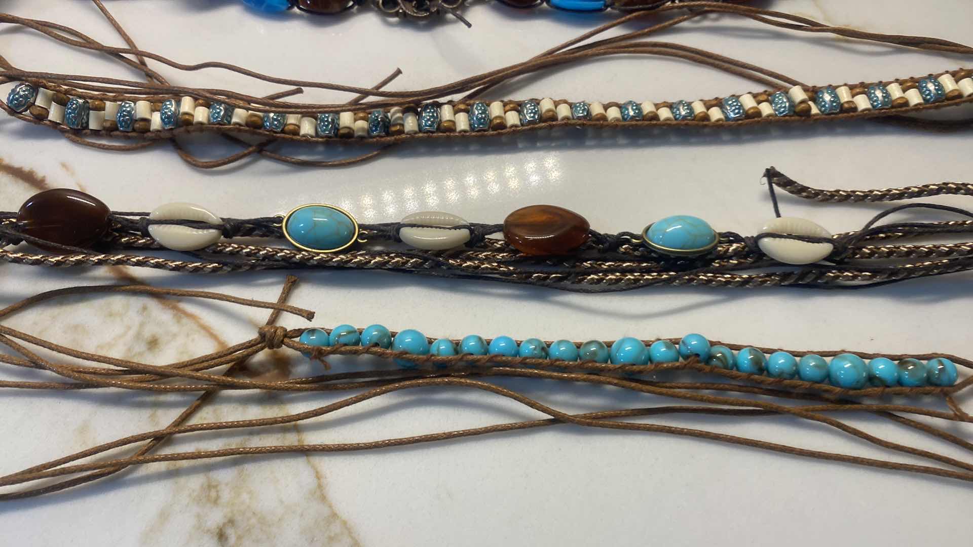 Photo 1 of NEW - 7 HAT BANDS IN REUSABLE BLACK NYLON BAG