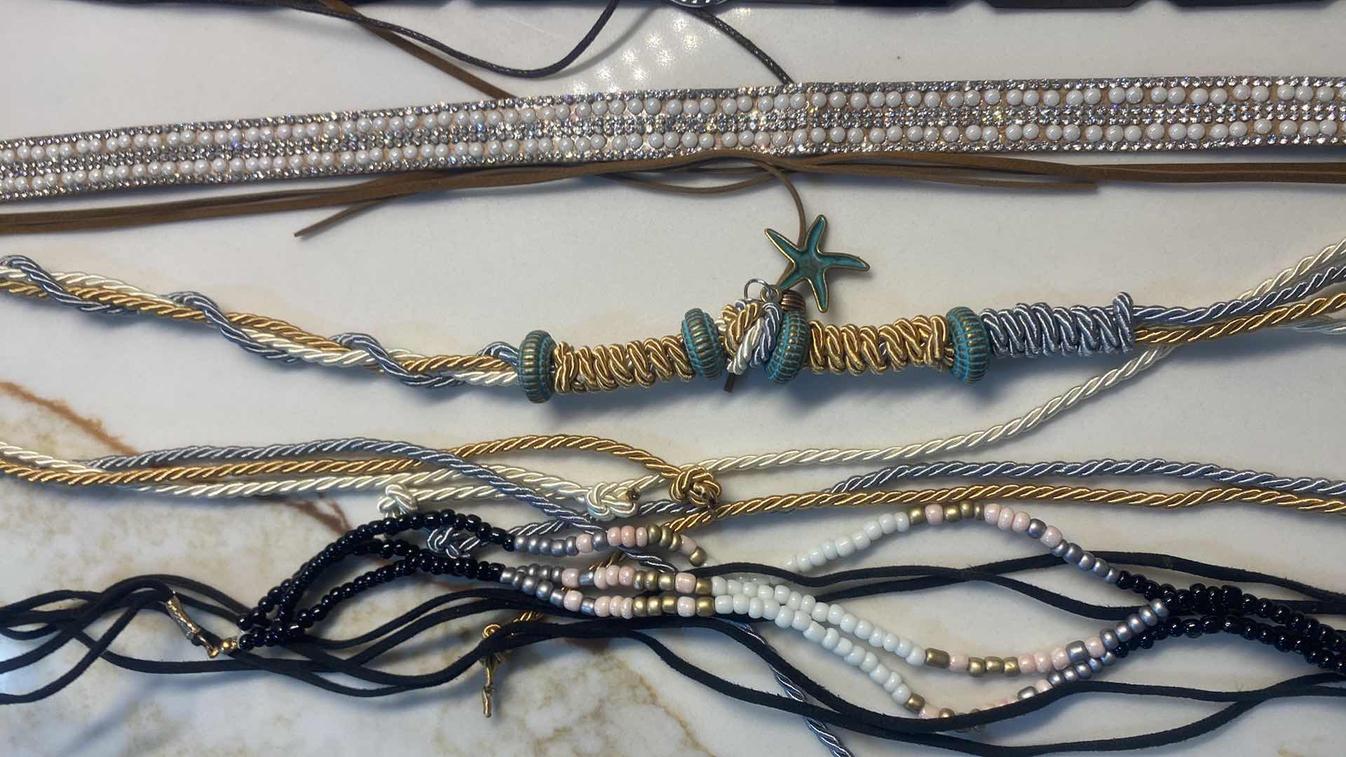 Photo 1 of NEW - 7 HAT BANDS IN REUSABLE BLACK NYLON BAG