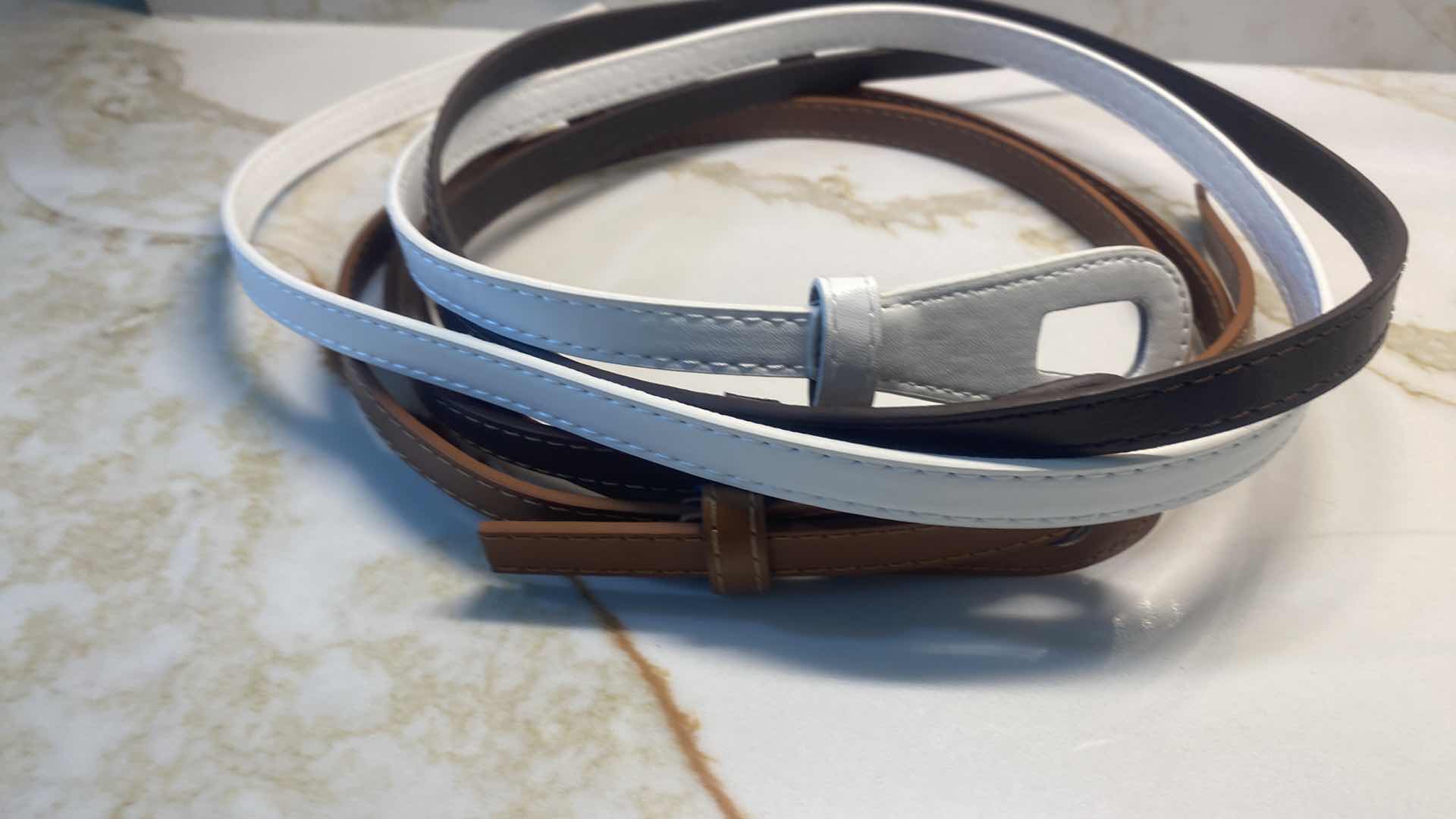 Photo 1 of NEW - 5 BELTS