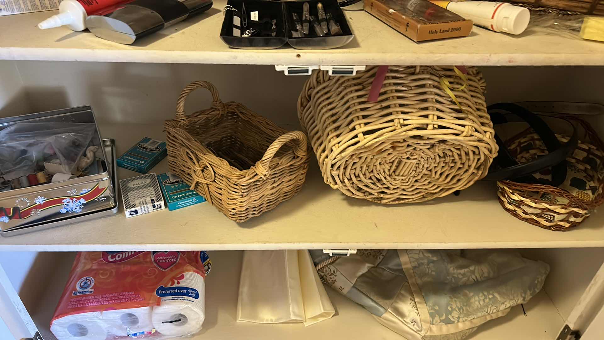 Photo 1 of CONTENTS OF CLOSET IN PRIMARY BEDROOM