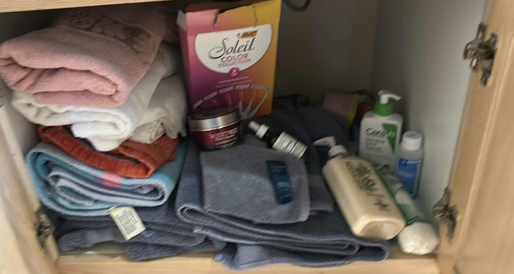 Photo 1 of CONTENTS OF CABINET IN UPSTAIRS BATHROOM