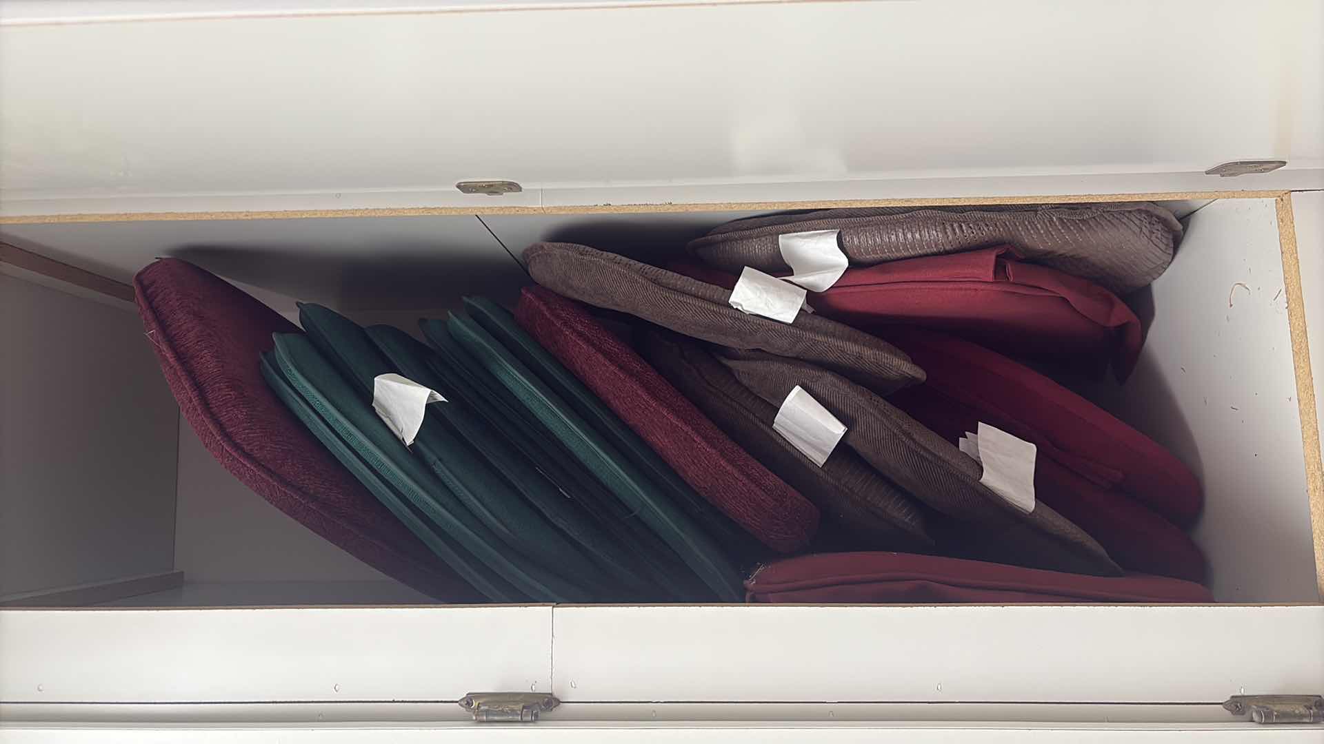 Photo 1 of CONTENTS OF CABINET-CHAIR SEAT CUSHIONS