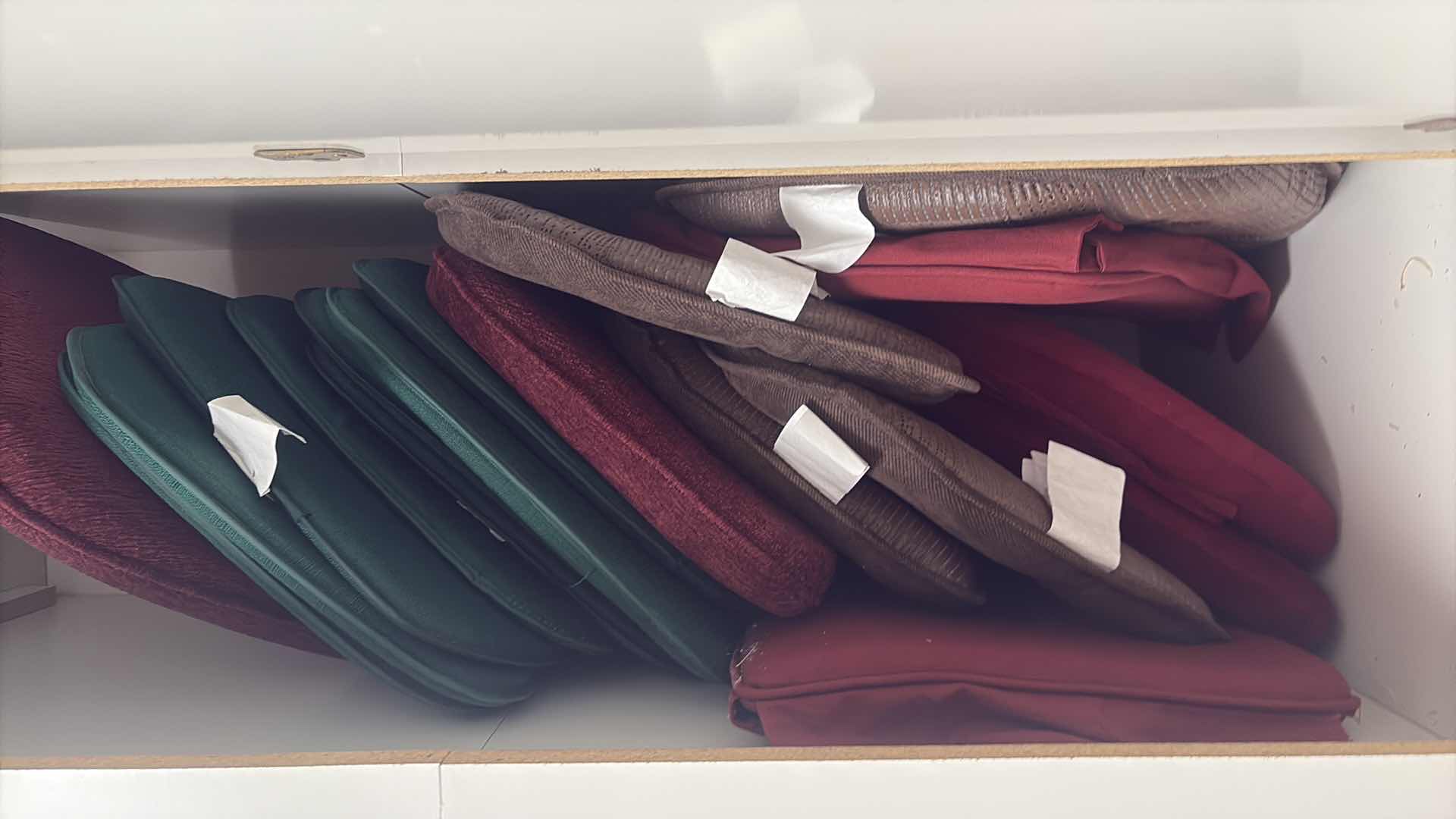 Photo 1 of CONTENTS OF CABINET-CHAIR SEAT CUSHIONS