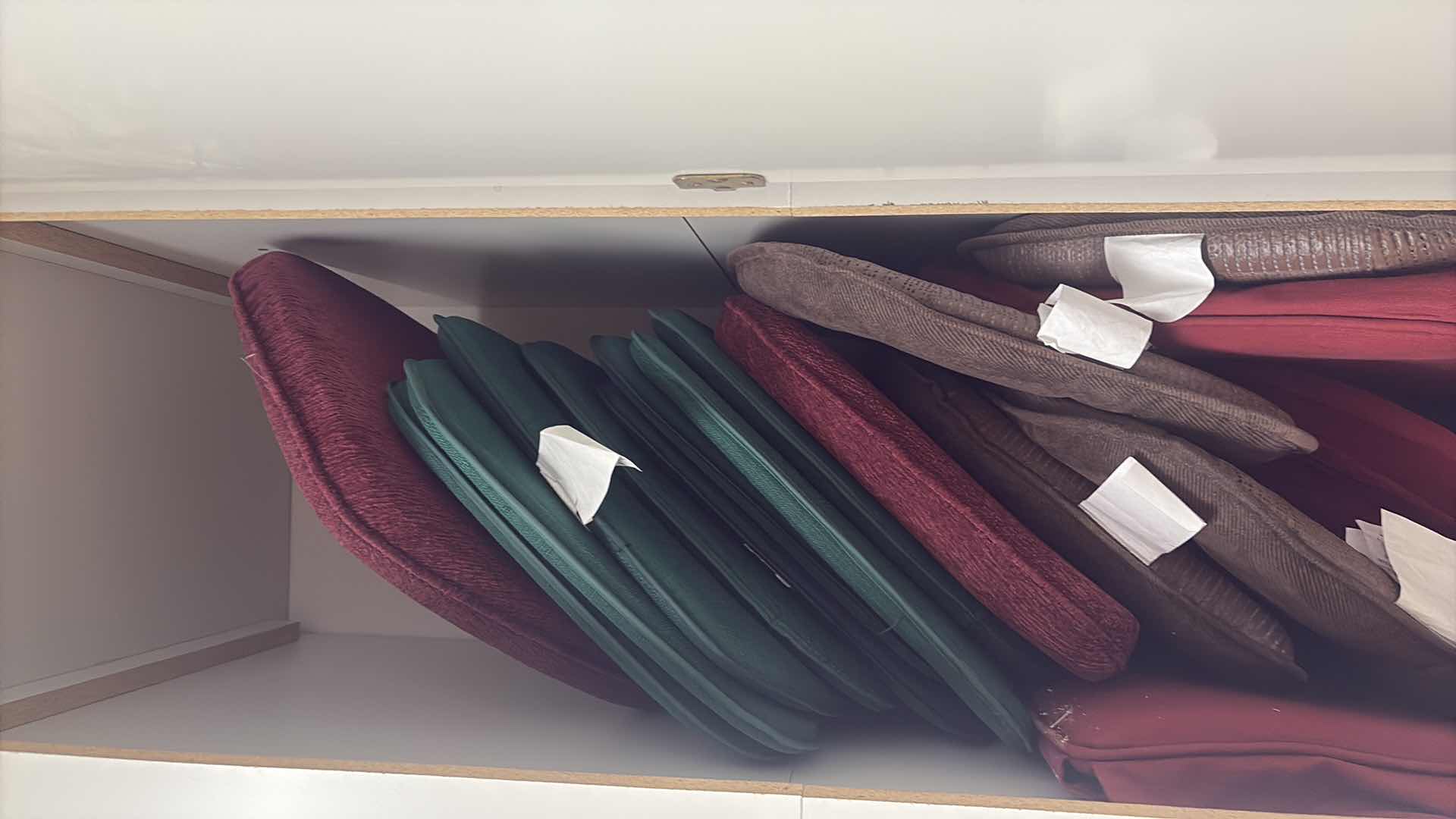 Photo 1 of CONTENTS OF CABINET-CHAIR SEAT CUSHIONS